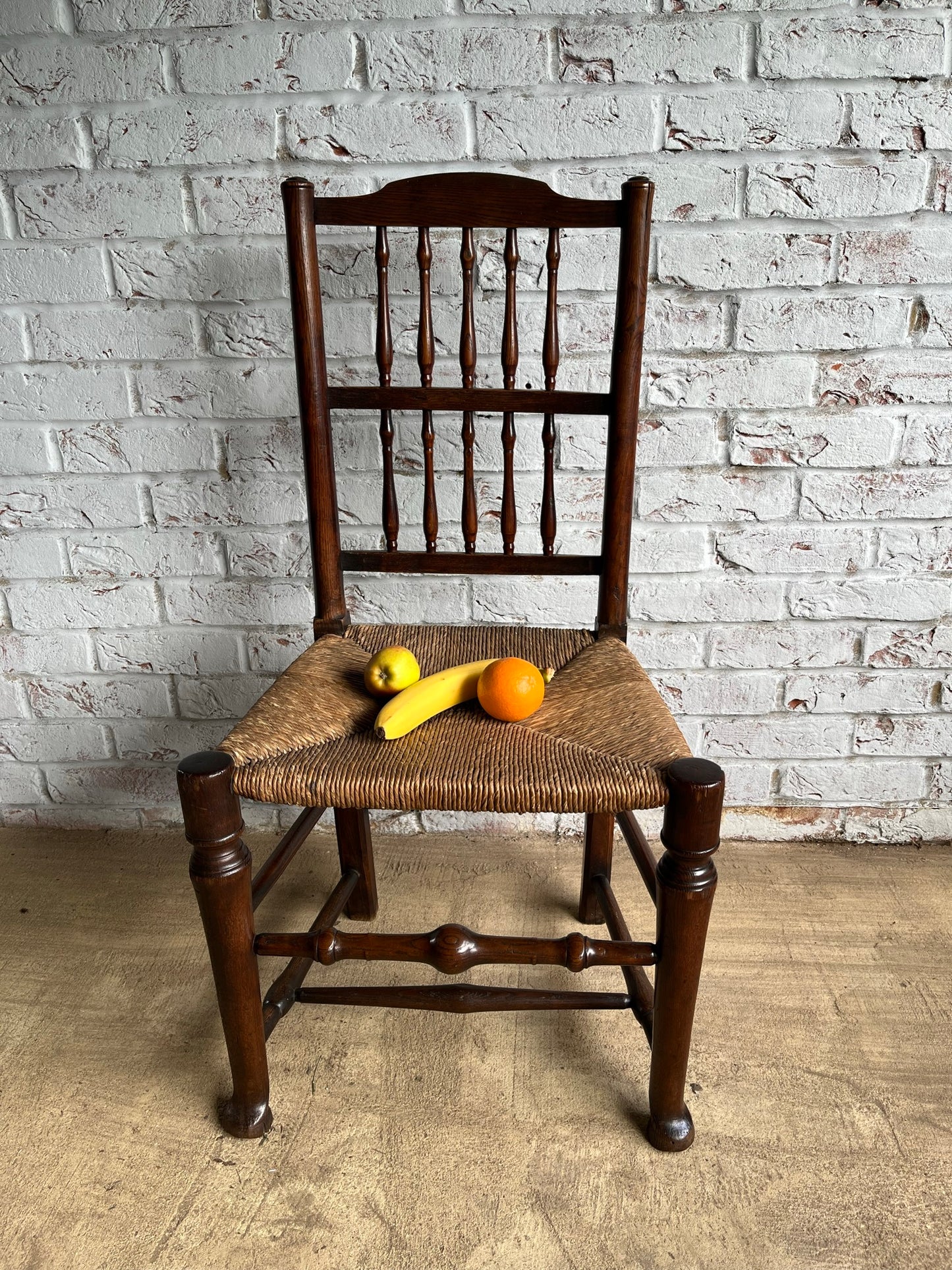 19th century spindle back chair.