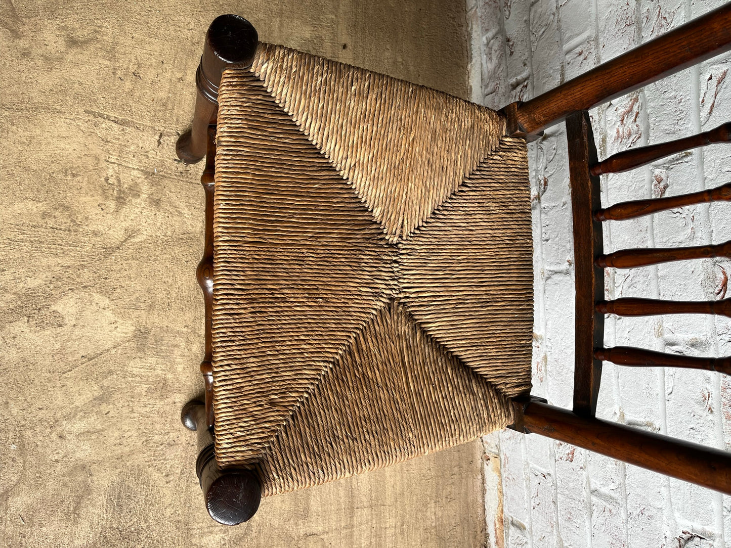 19th century spindle back chair.