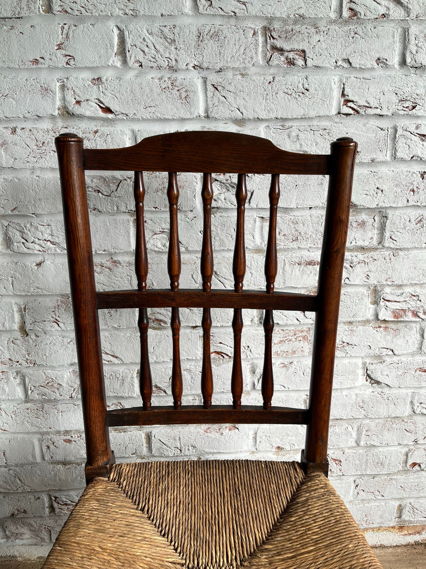 19th century spindle back chair.