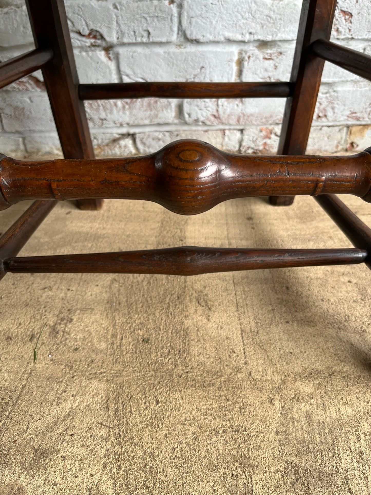 19th century spindle back chair.
