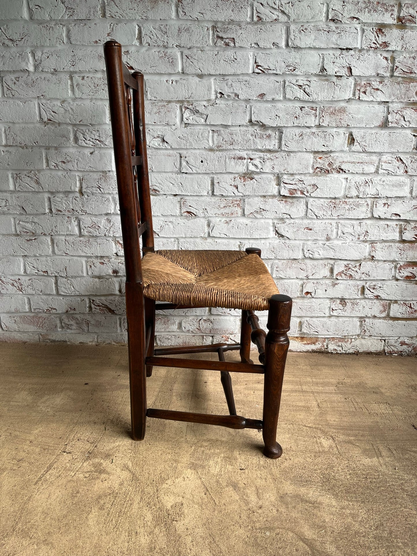 19th century spindle back chair.