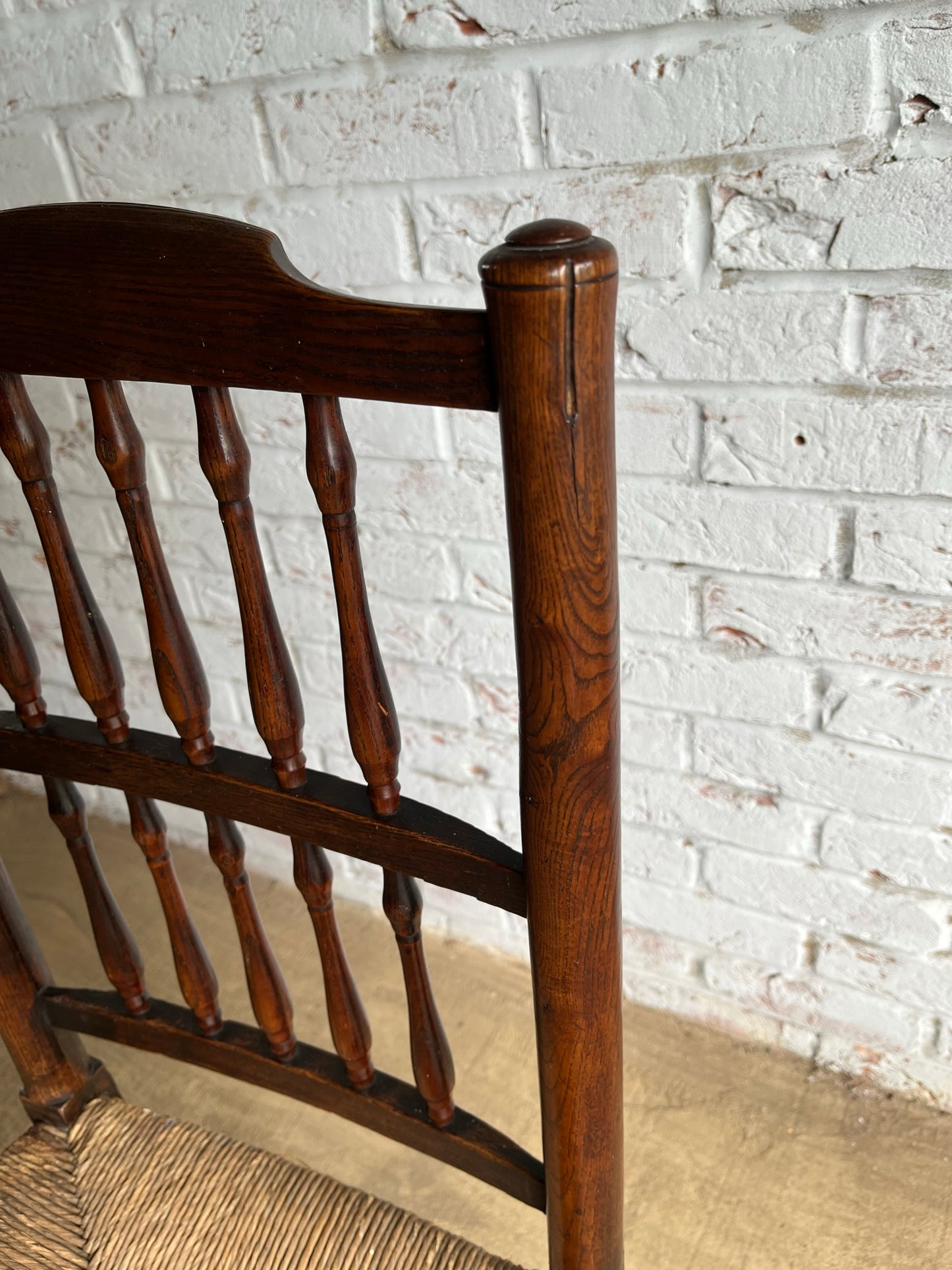19th century spindle back chair.
