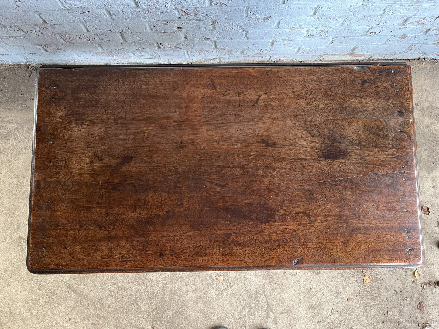 18th century mahogany side or bedroom table with drop leaf.
