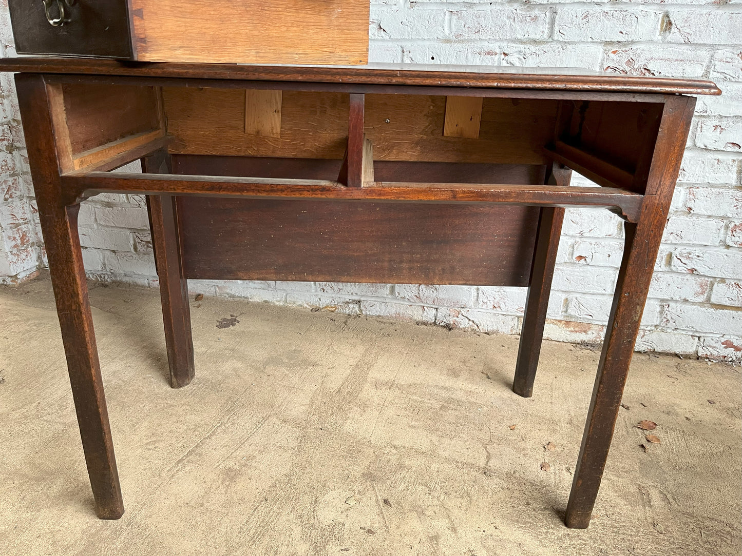 18th century mahogany side or bedroom table with drop leaf.