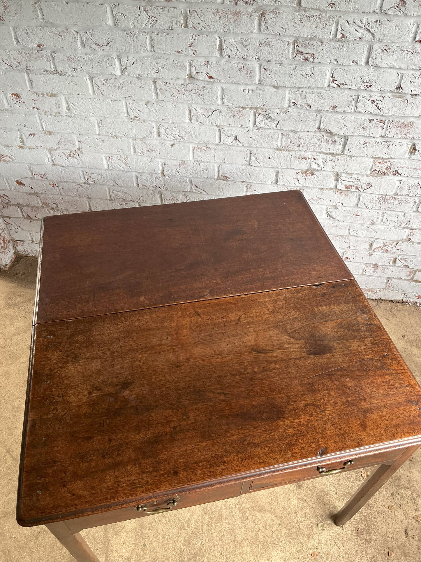 18th century mahogany side or bedroom table with drop leaf.