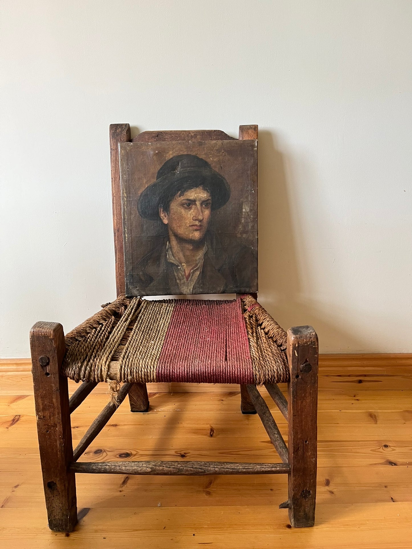 19th century oil painting of a young man.
