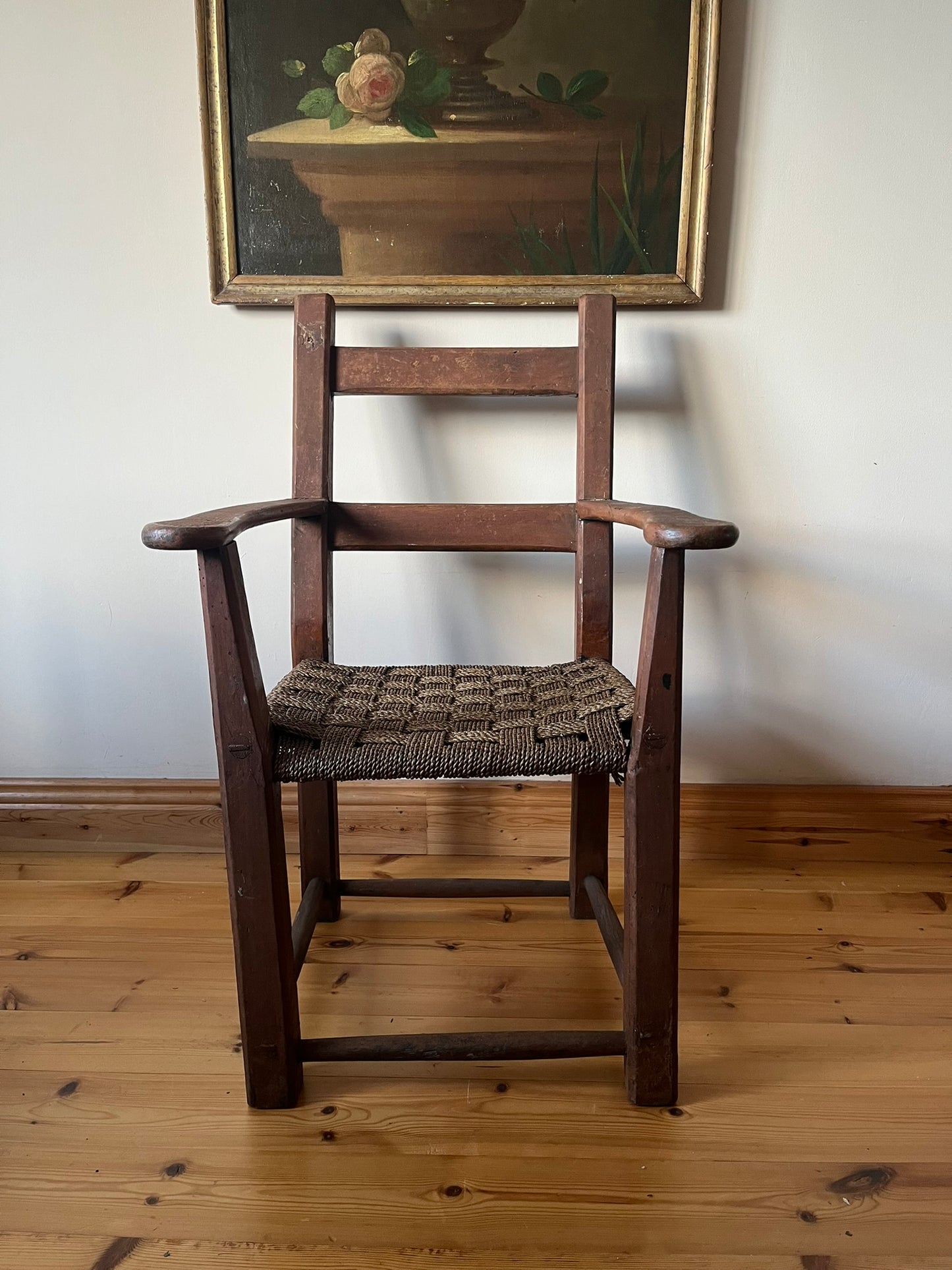 19th century Irish vernacular painted sugan armchair.