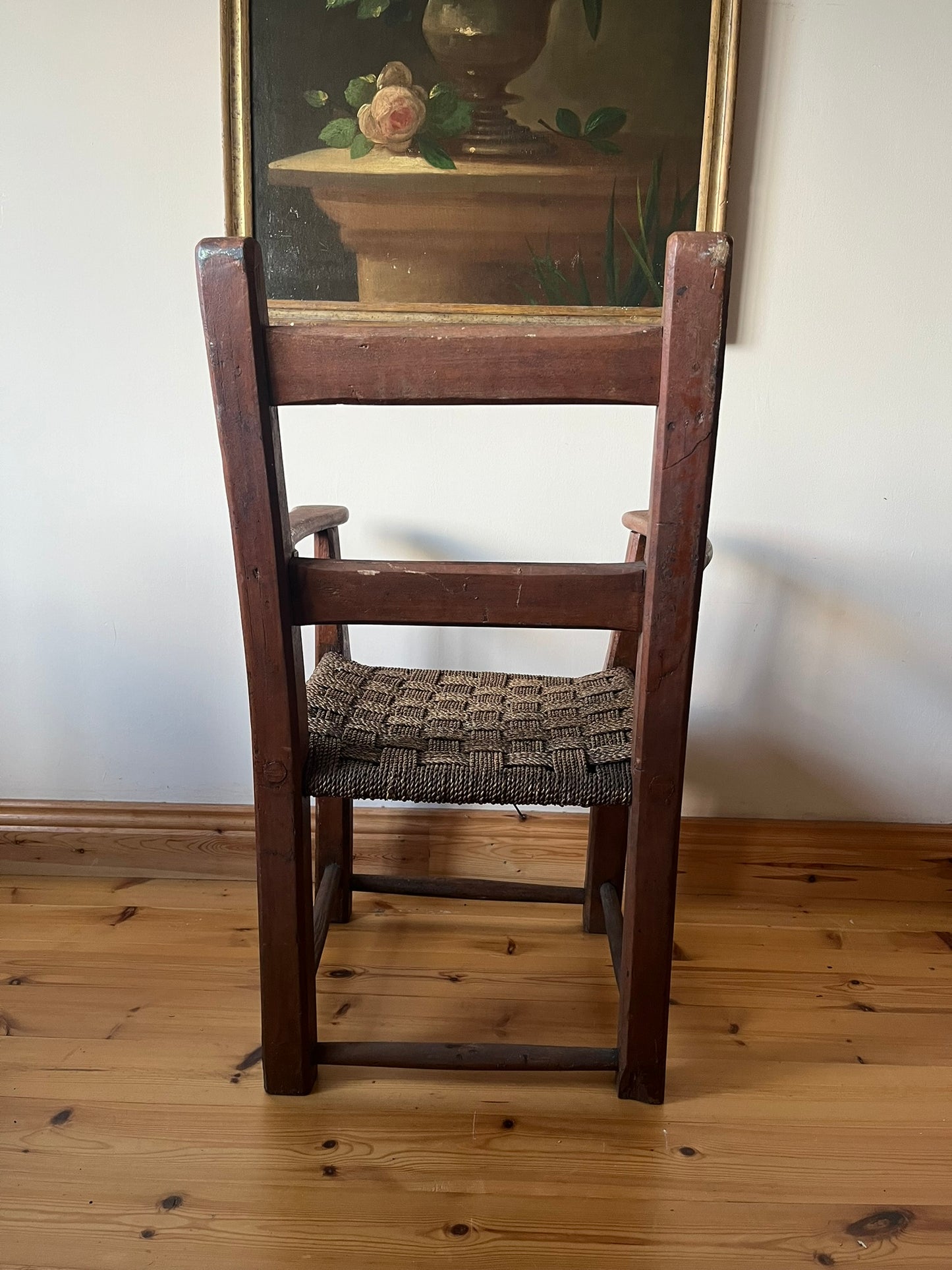 19th century Irish vernacular painted sugan armchair.
