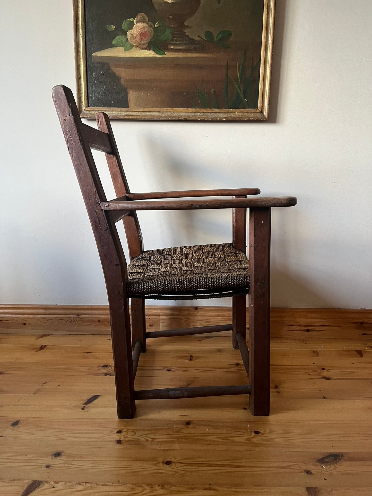19th century Irish vernacular painted sugan armchair.