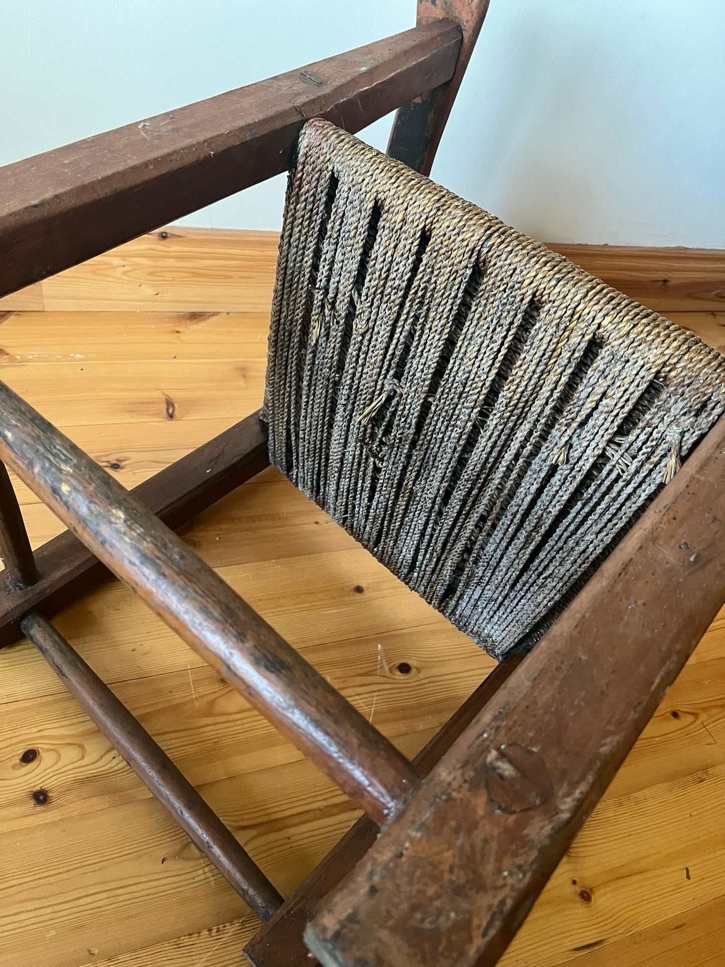 19th century Irish vernacular painted sugan armchair.