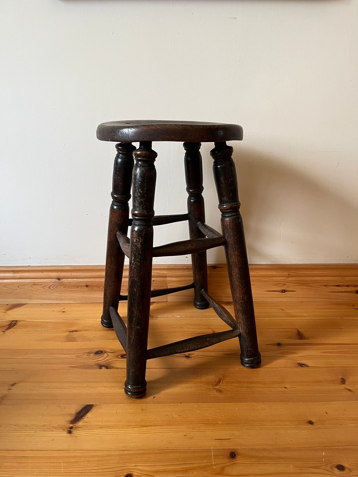 Oak and elm stool, early 20th century.