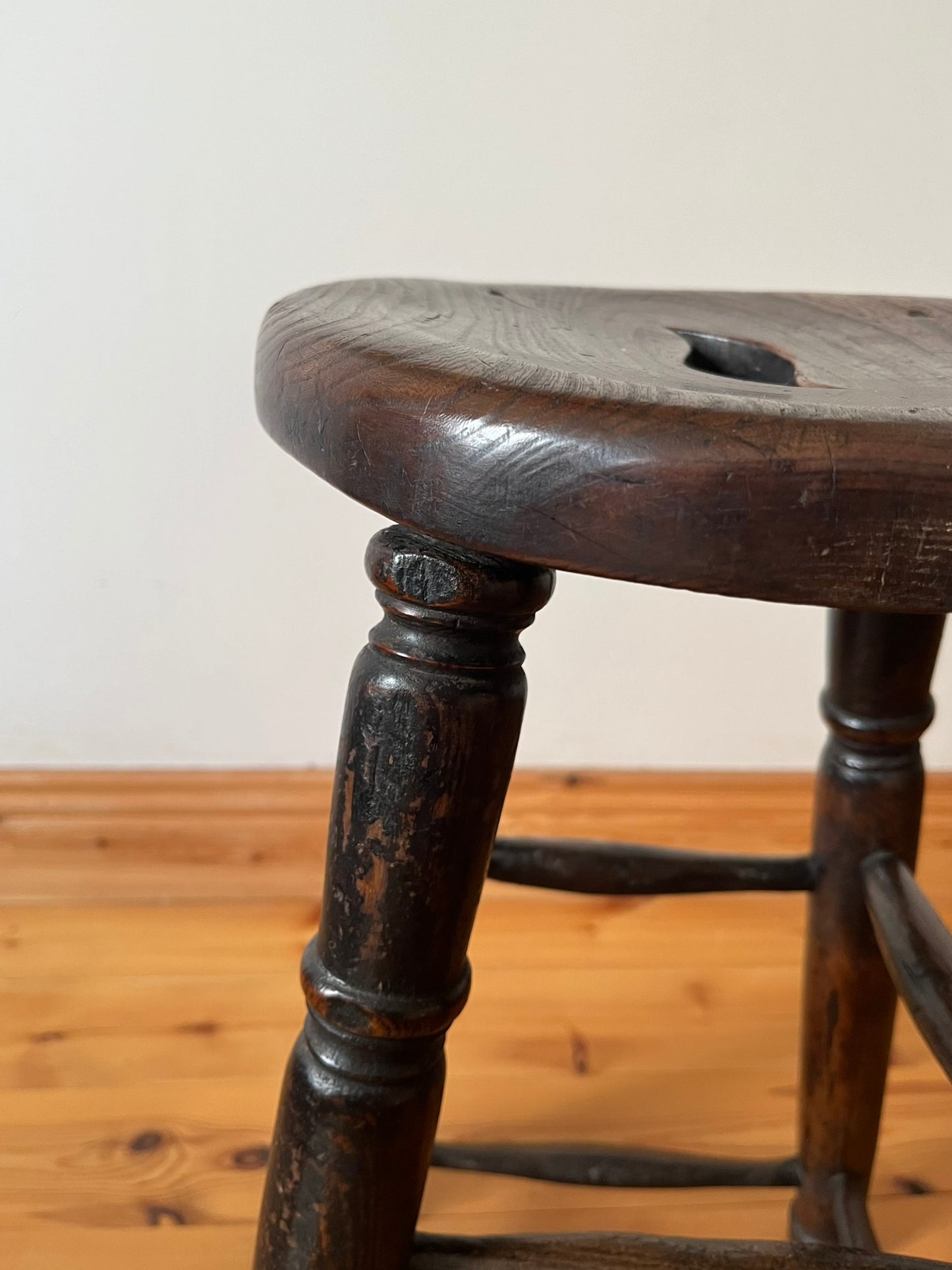 Oak and elm stool, early 20th century.