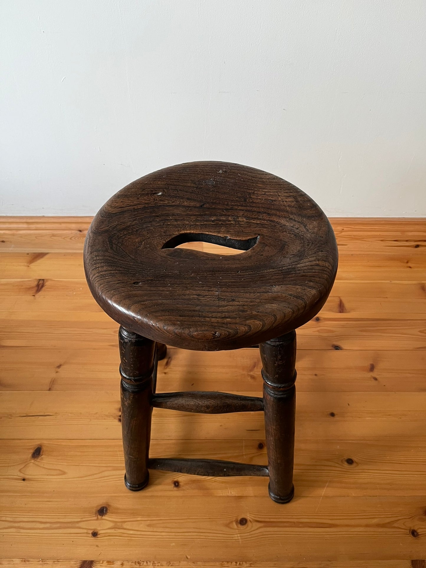 Oak and elm stool, early 20th century.