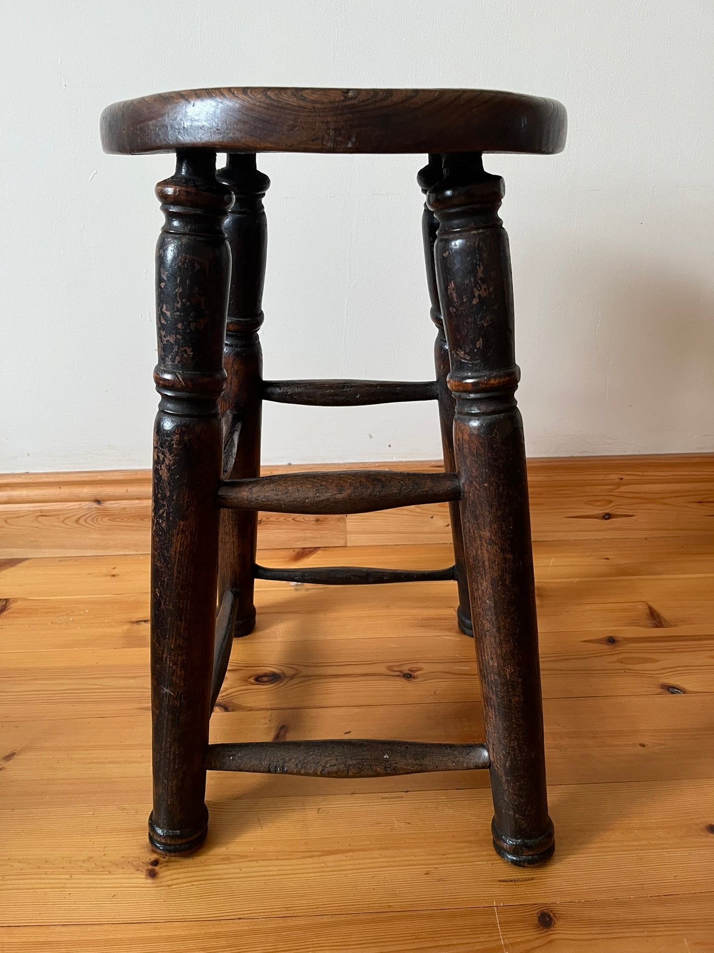 Oak and elm stool, early 20th century.