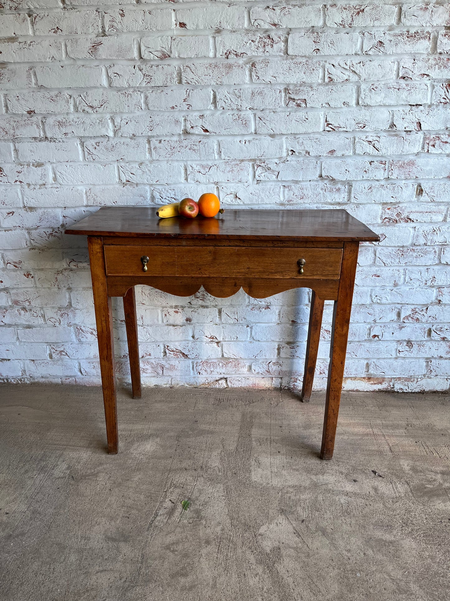 Early 19th century fruitwood side table.