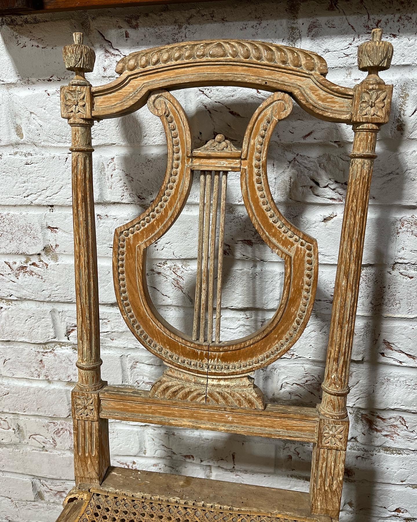 Pair of late 19th century French lyre-back side chairs.