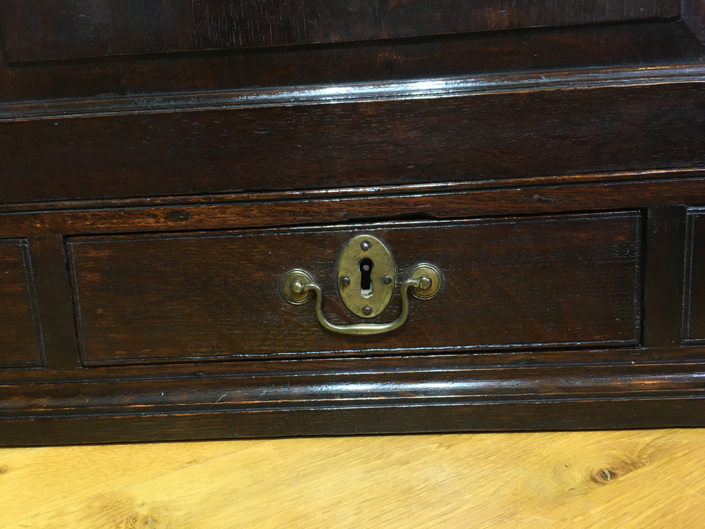 Early 18th century Georgian oak corner cupboard (with spooky writing)