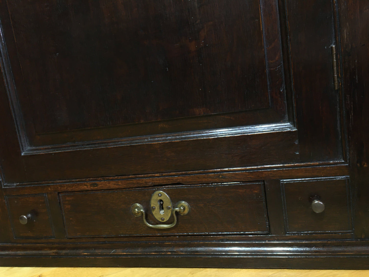 Early 18th century Georgian oak corner cupboard (with spooky writing)