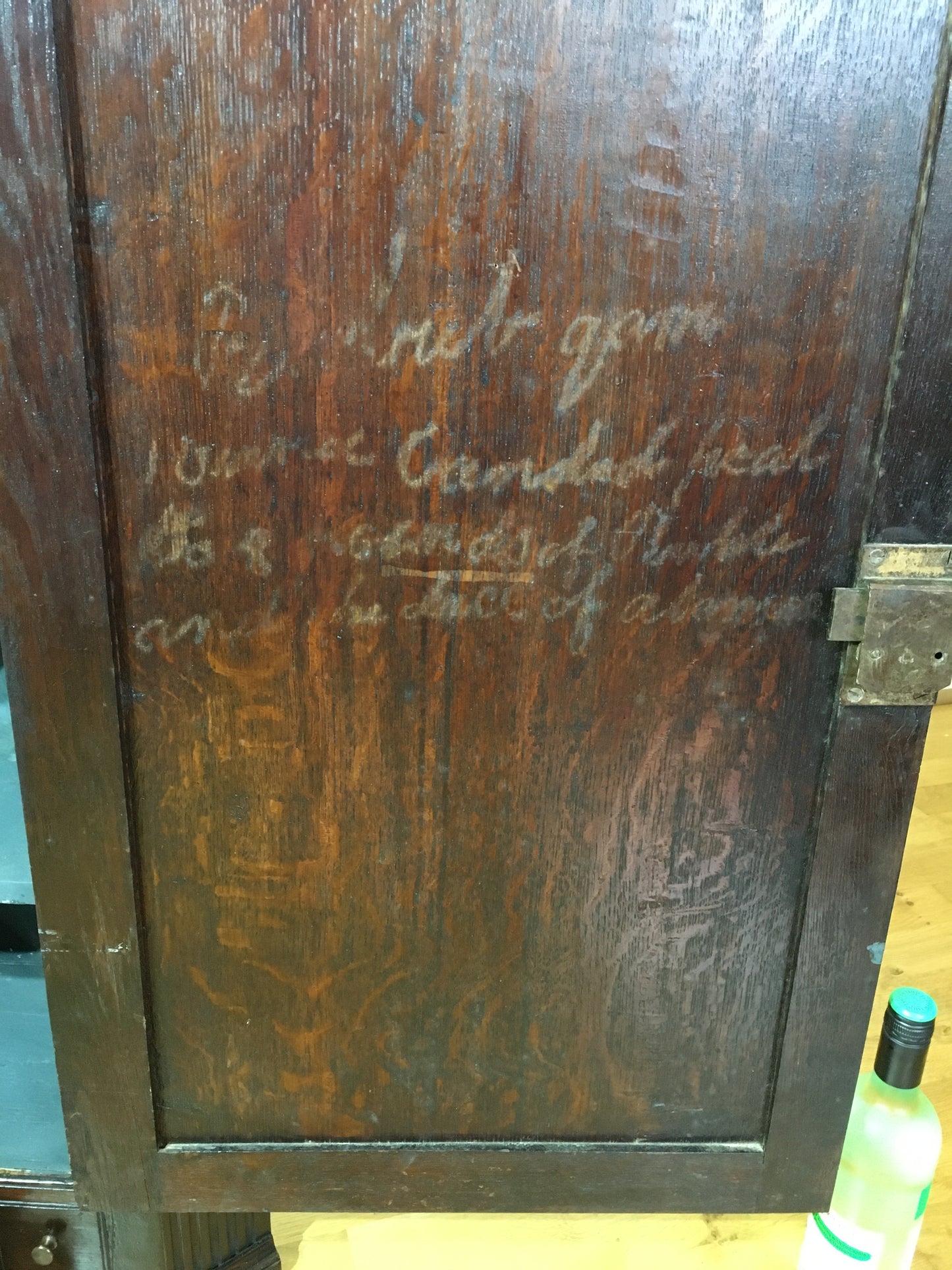 Early 18th century Georgian oak corner cupboard (with spooky writing)