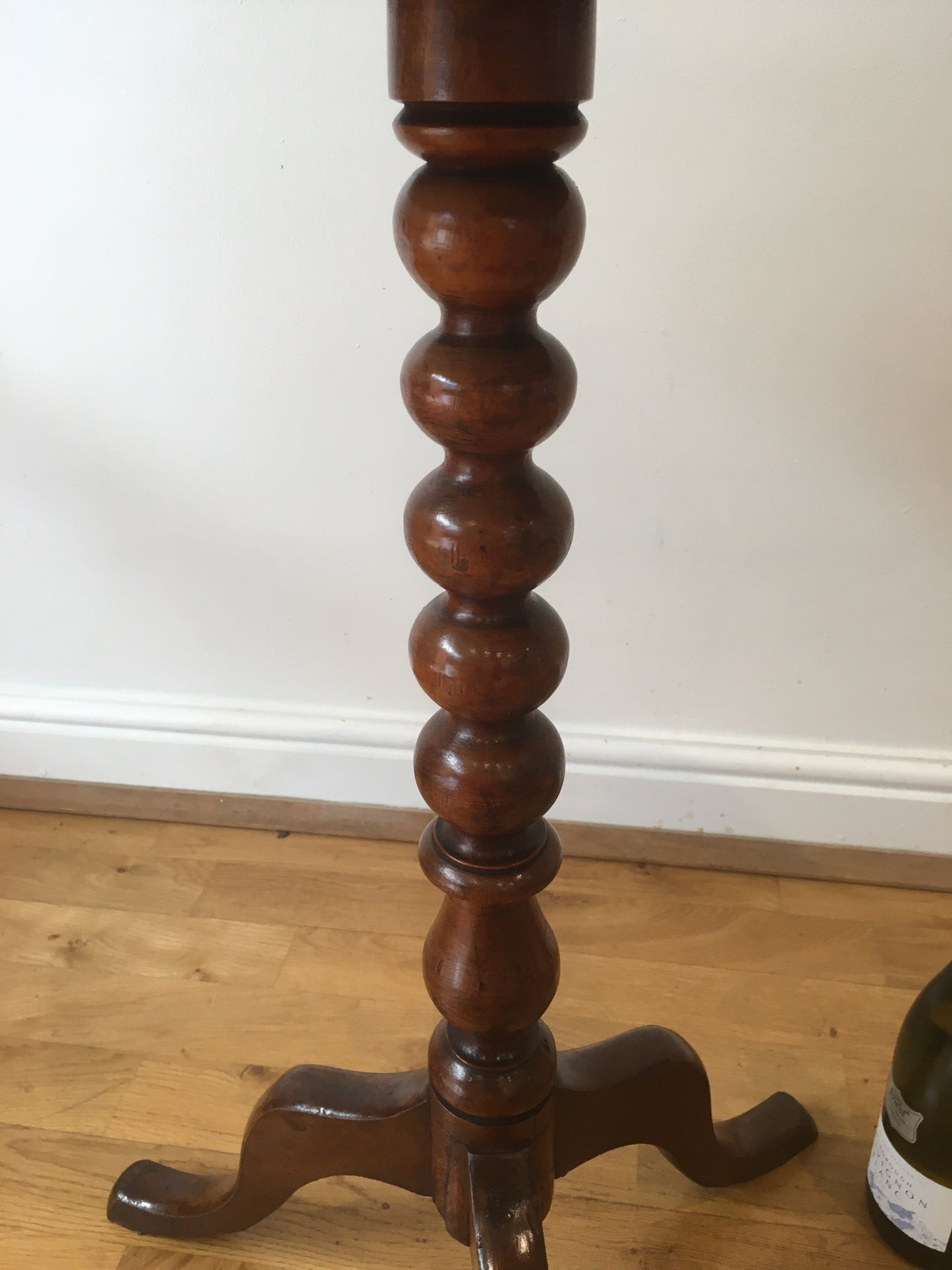 19th century fruitwood tilt-top tripod table on bobbin column