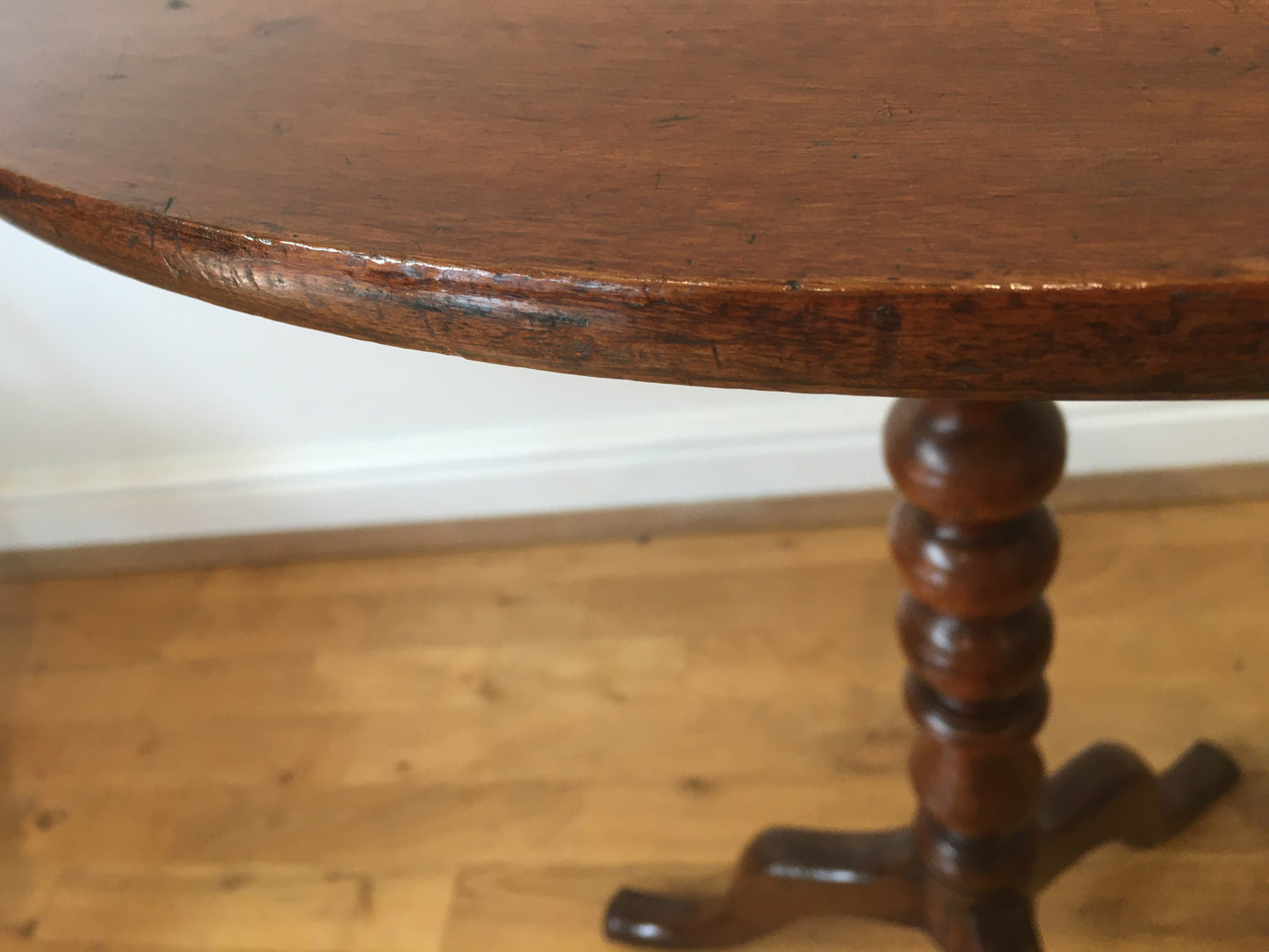 19th century fruitwood tilt-top tripod table on bobbin column