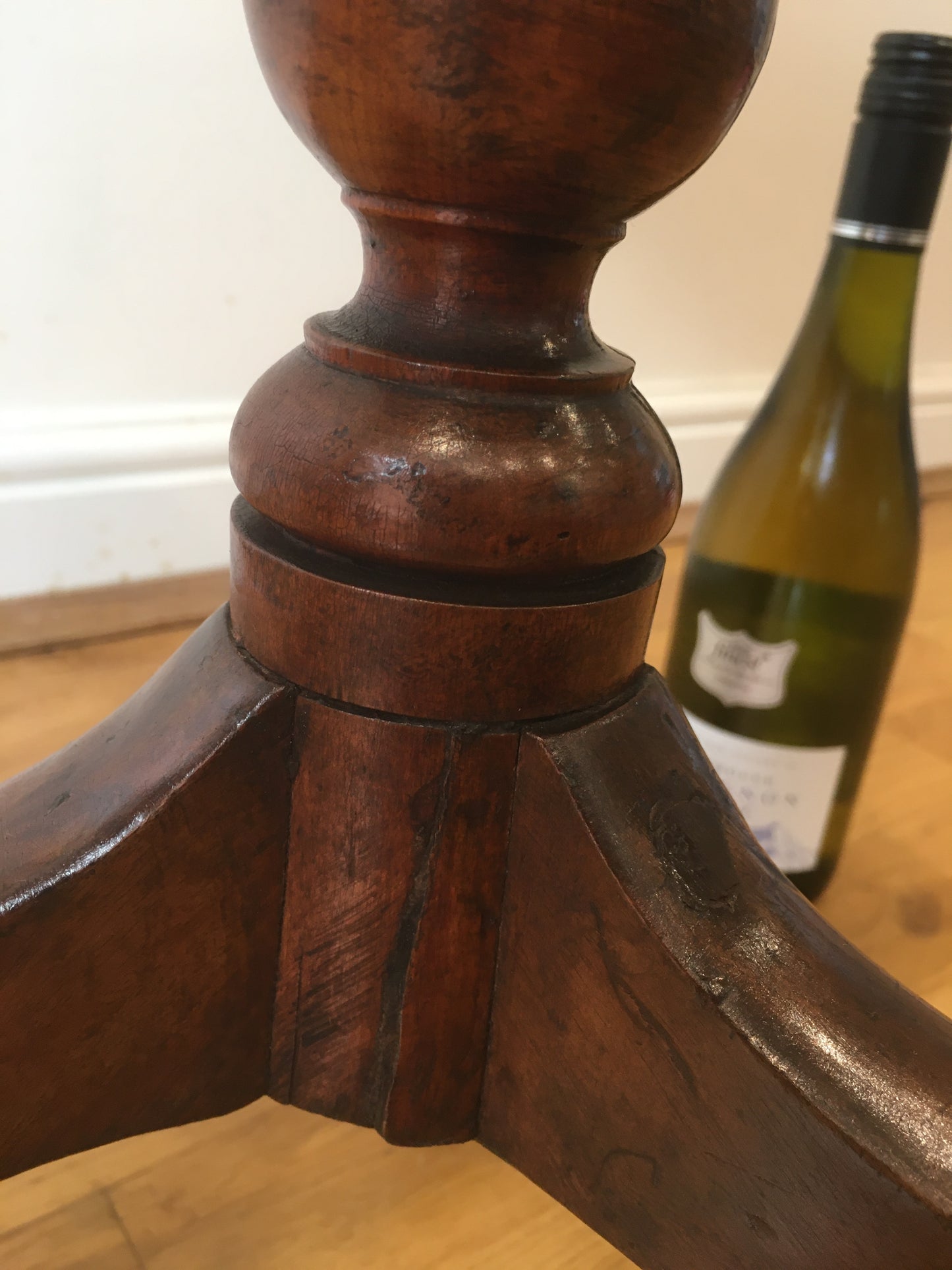 19th century fruitwood tilt-top tripod table on bobbin column
