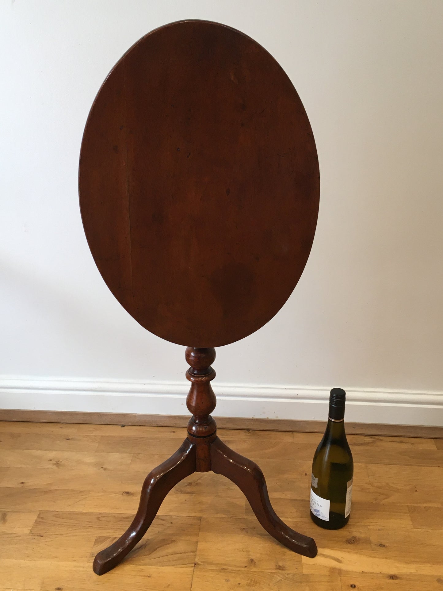 19th century fruitwood tilt-top tripod table on bobbin column