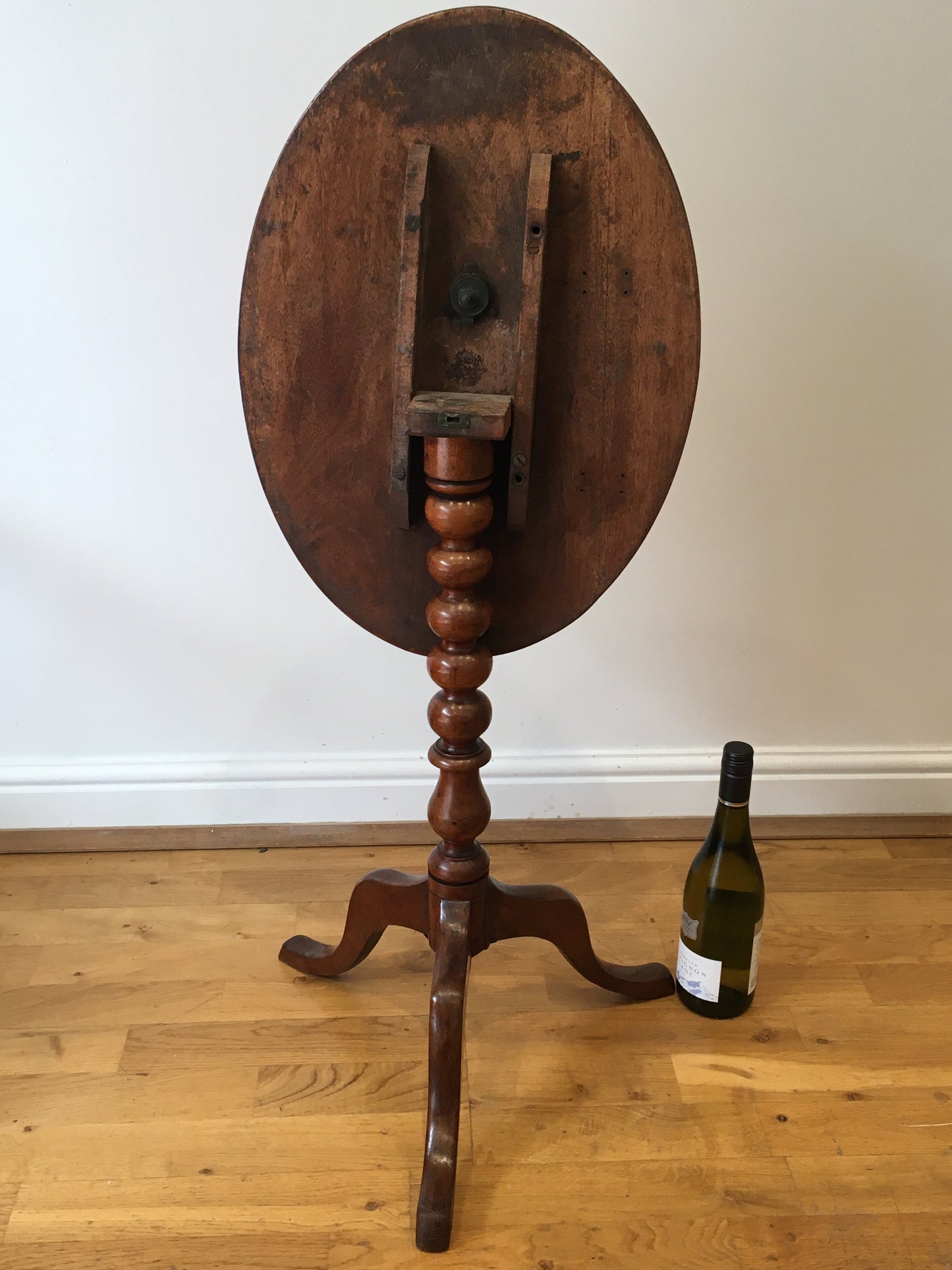 19th century fruitwood tilt-top tripod table on bobbin column