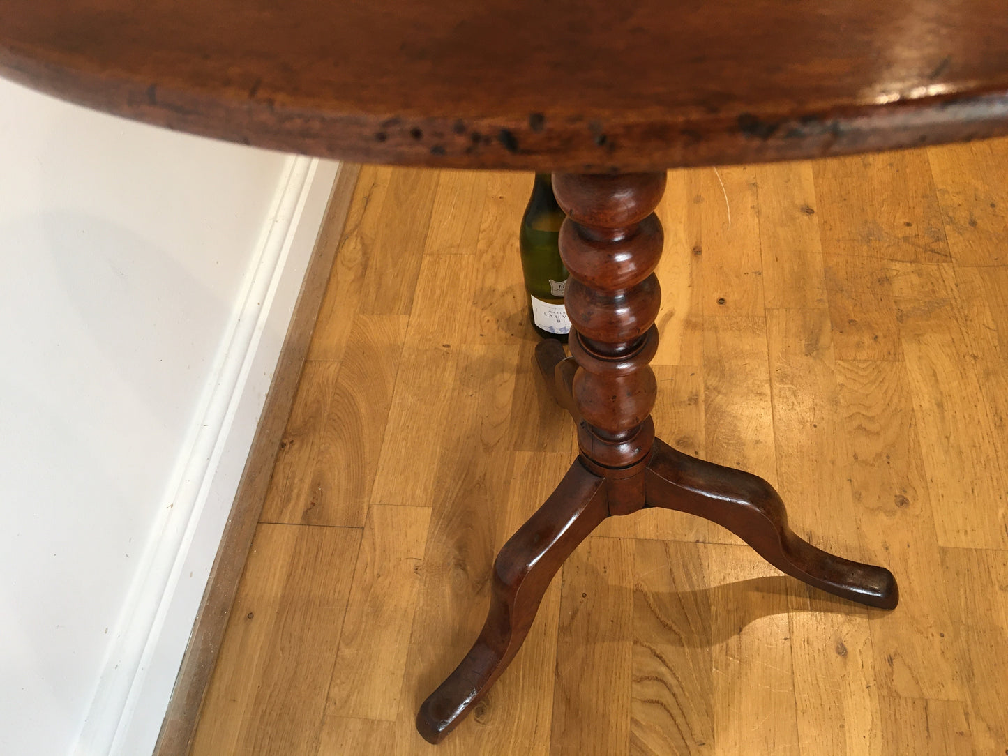 19th century fruitwood tilt-top tripod table on bobbin column