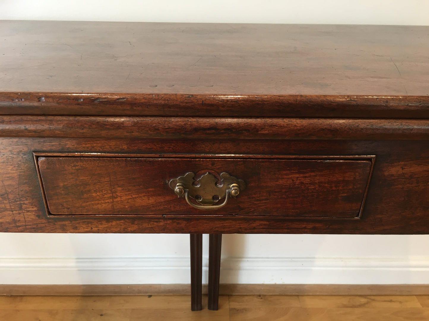 George III mahogany fold-over tea table