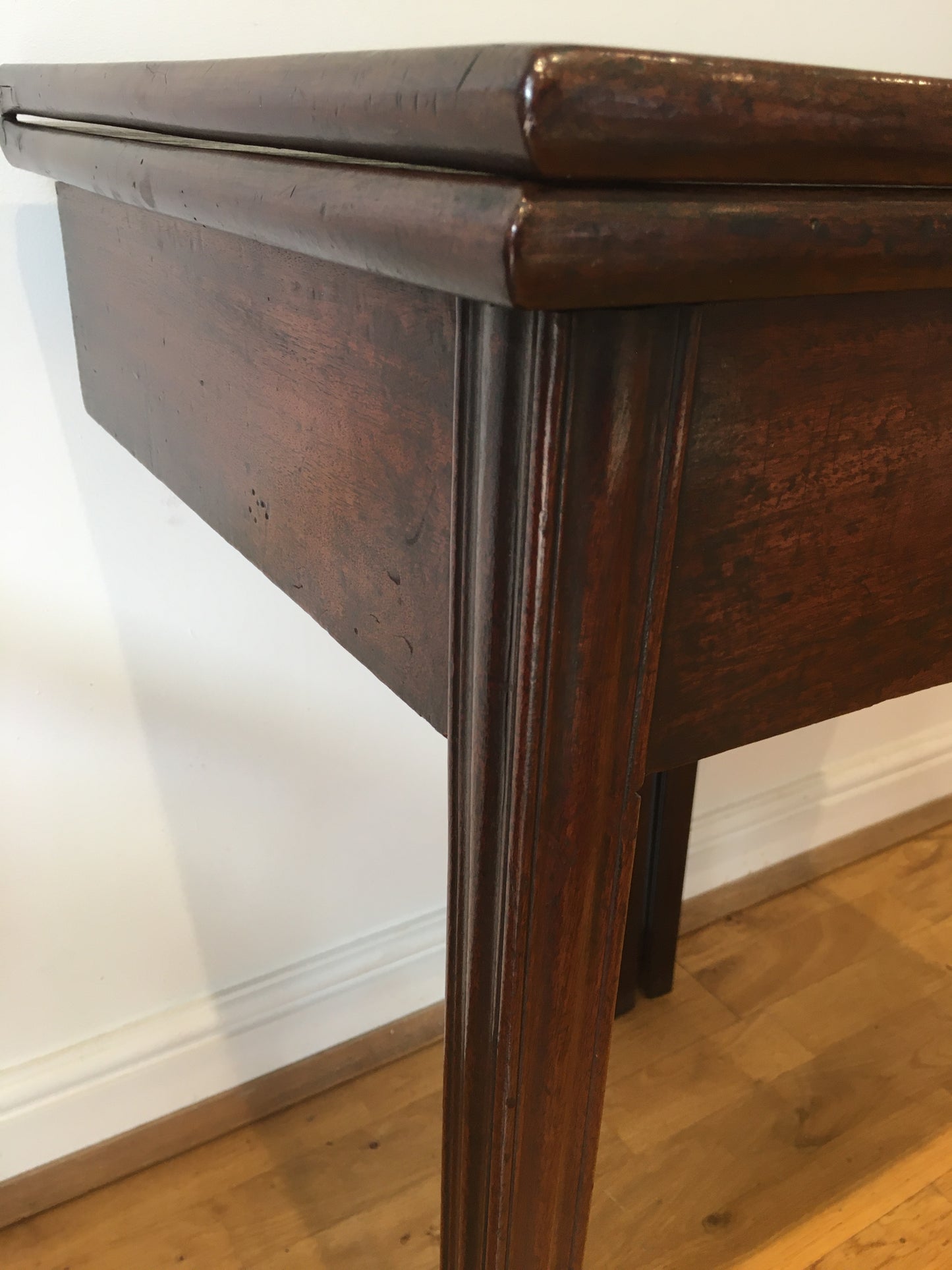 George III mahogany fold-over tea table