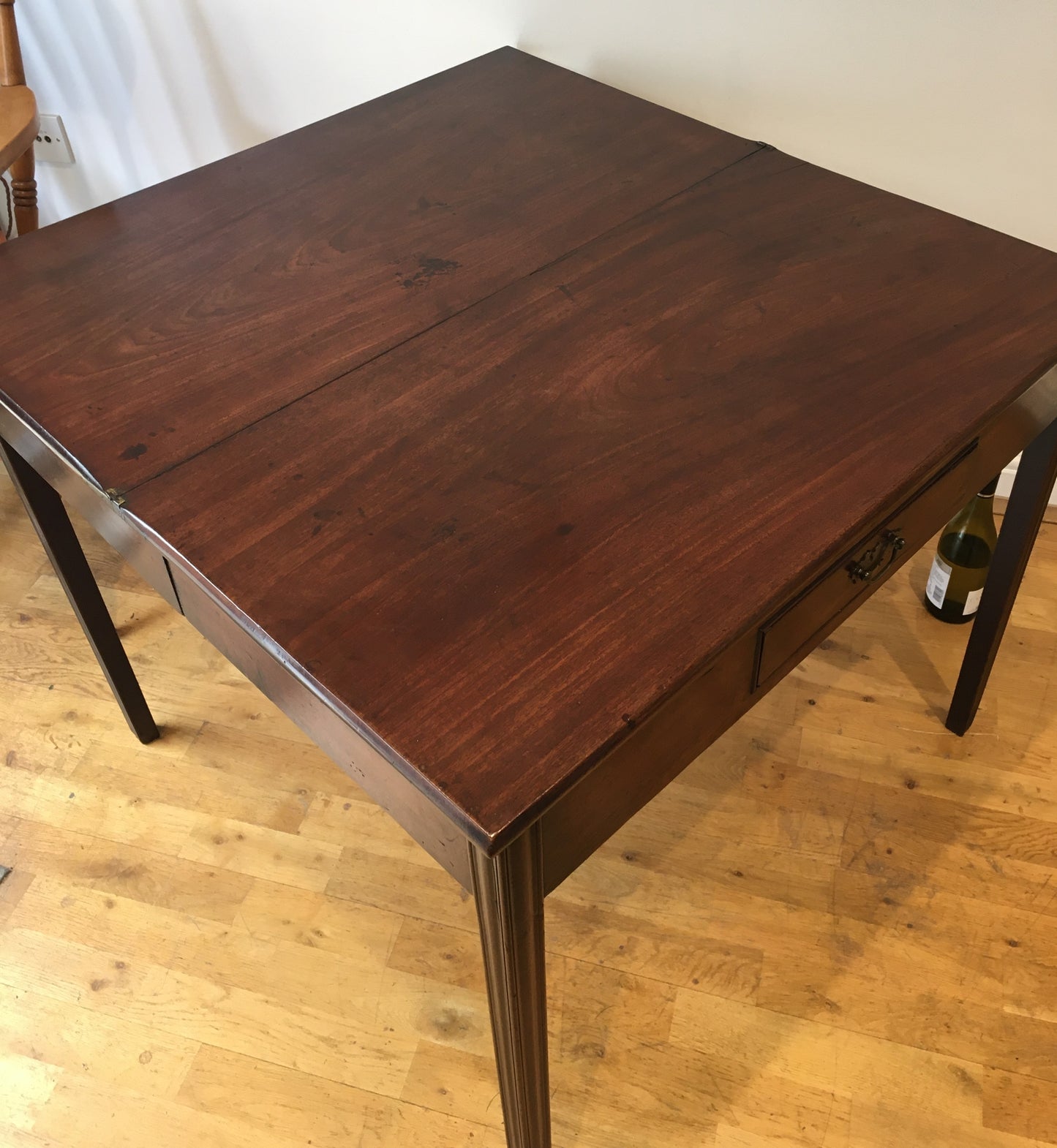 George III mahogany fold-over tea table