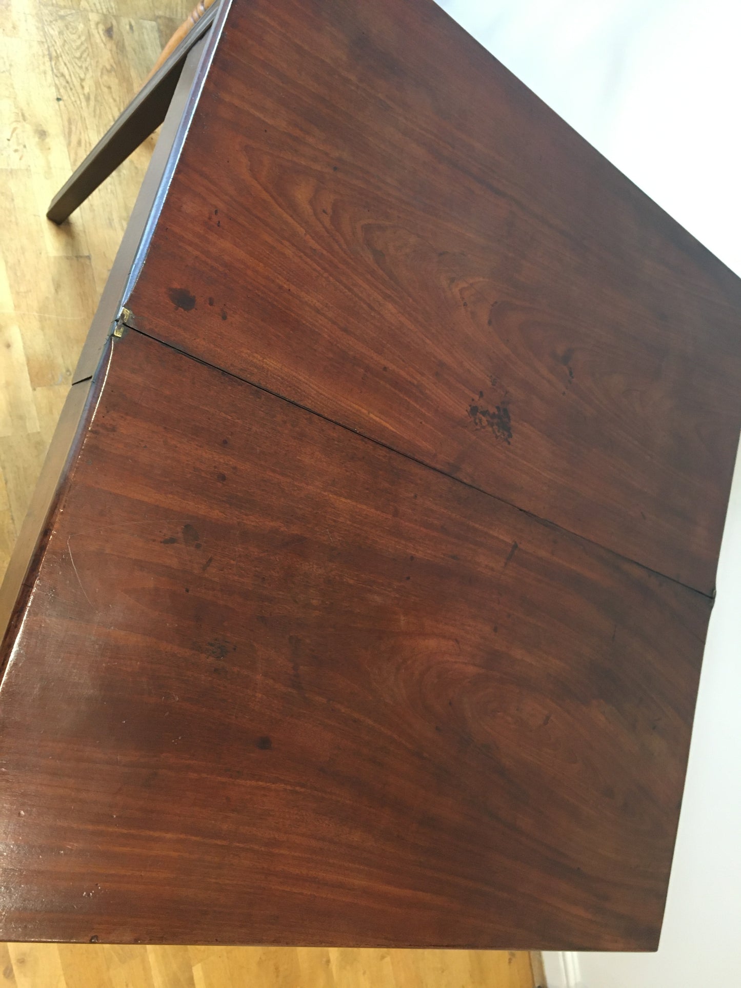 George III mahogany fold-over tea table