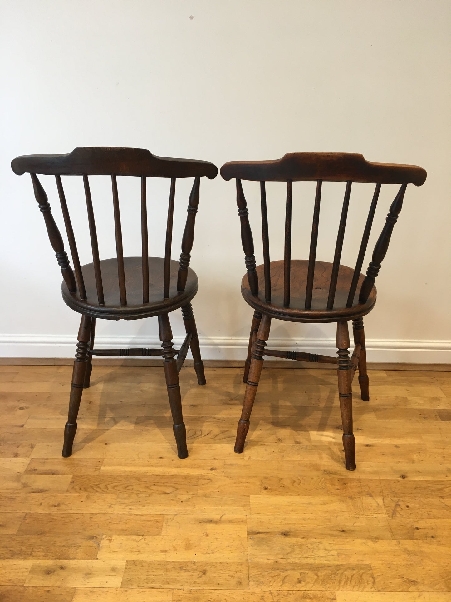 Pair of early 20th-century penny chairs.