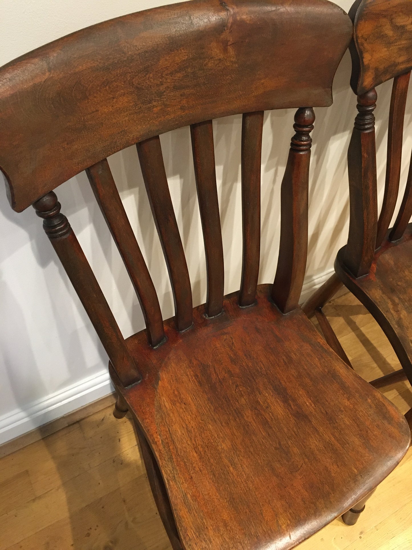 Pair of rustic lath-back Windsor kitchen chairs.