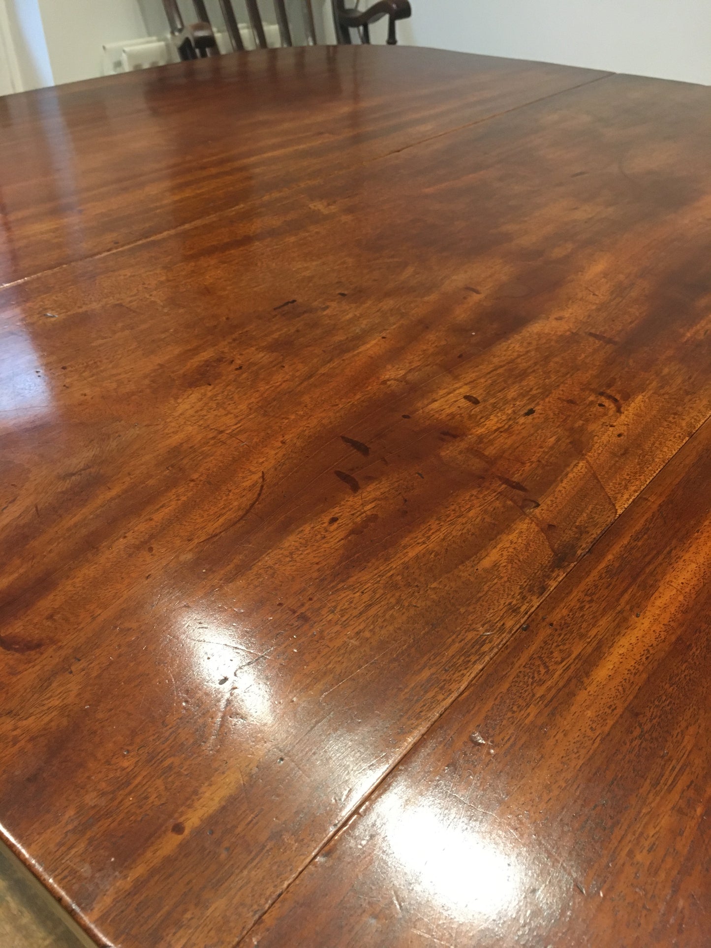 A fine, large George III mahogany drop-leaf dining table, with excellent provenance.