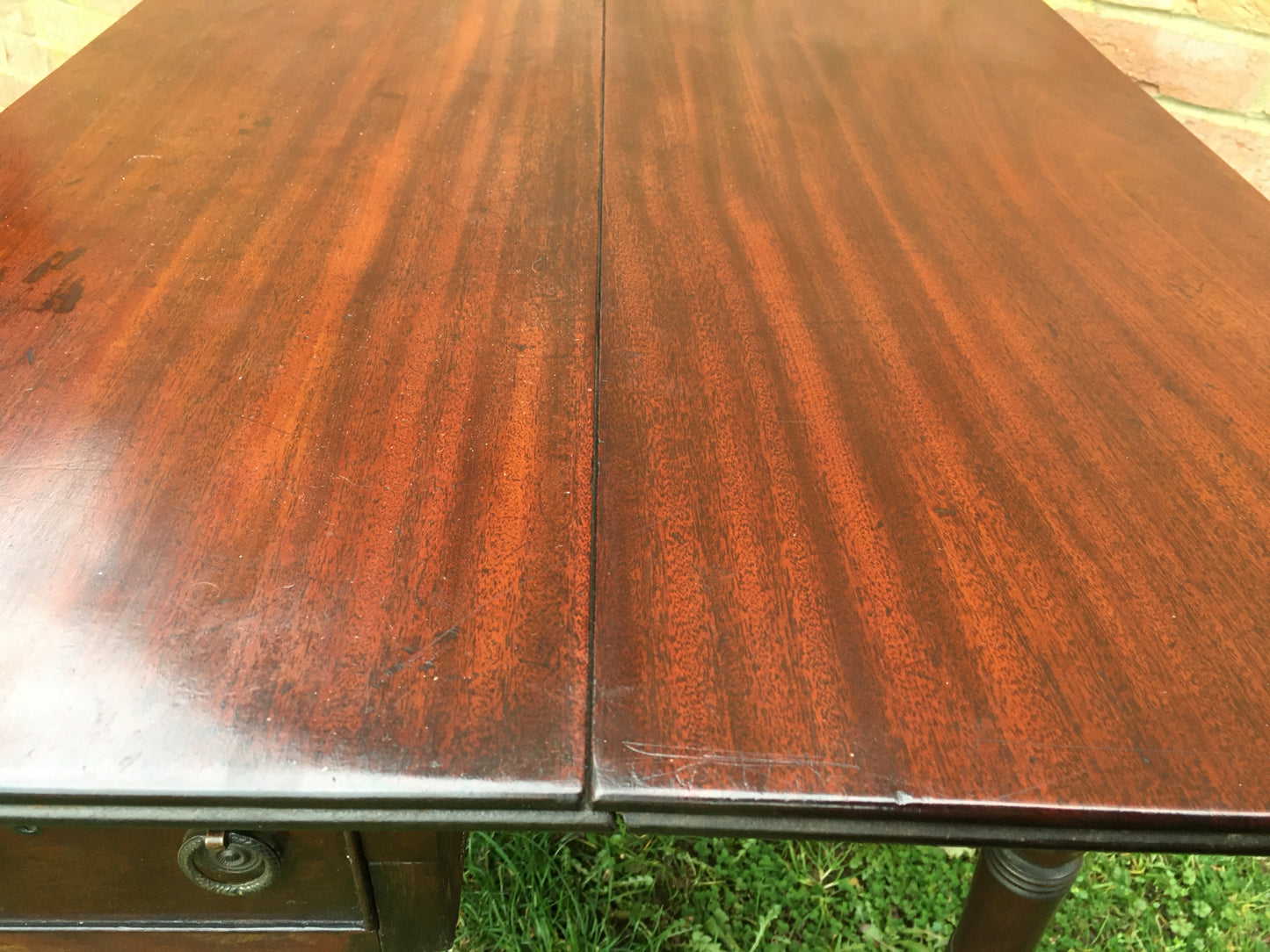 Late Georgian (or early William IV) mahogany double gate leg pembroke table.