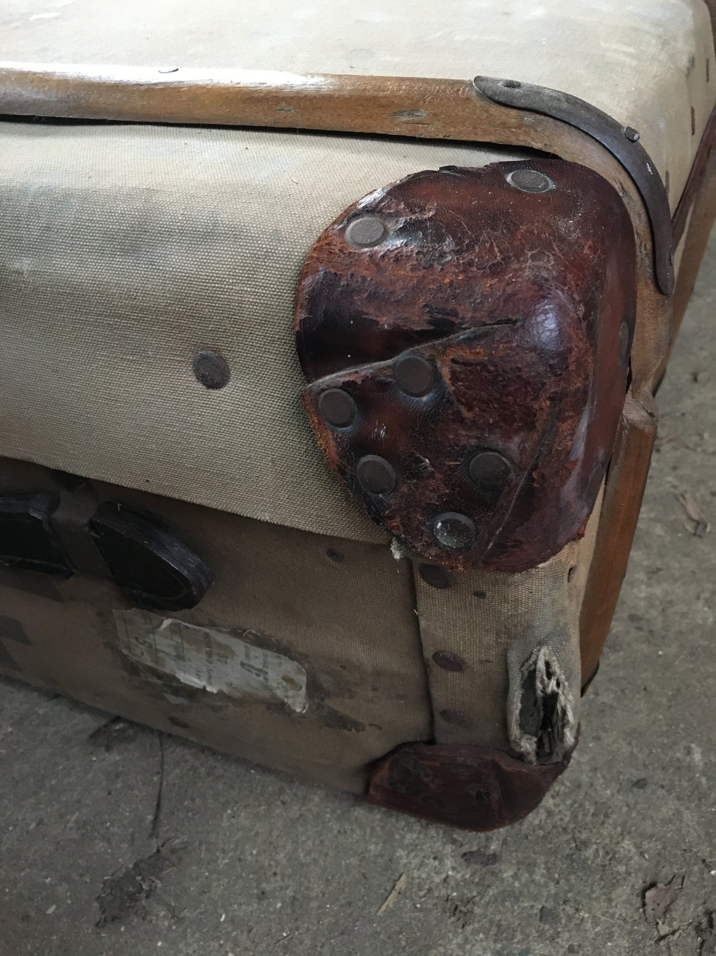 Untouched vintage steamer travel trunk with labels.