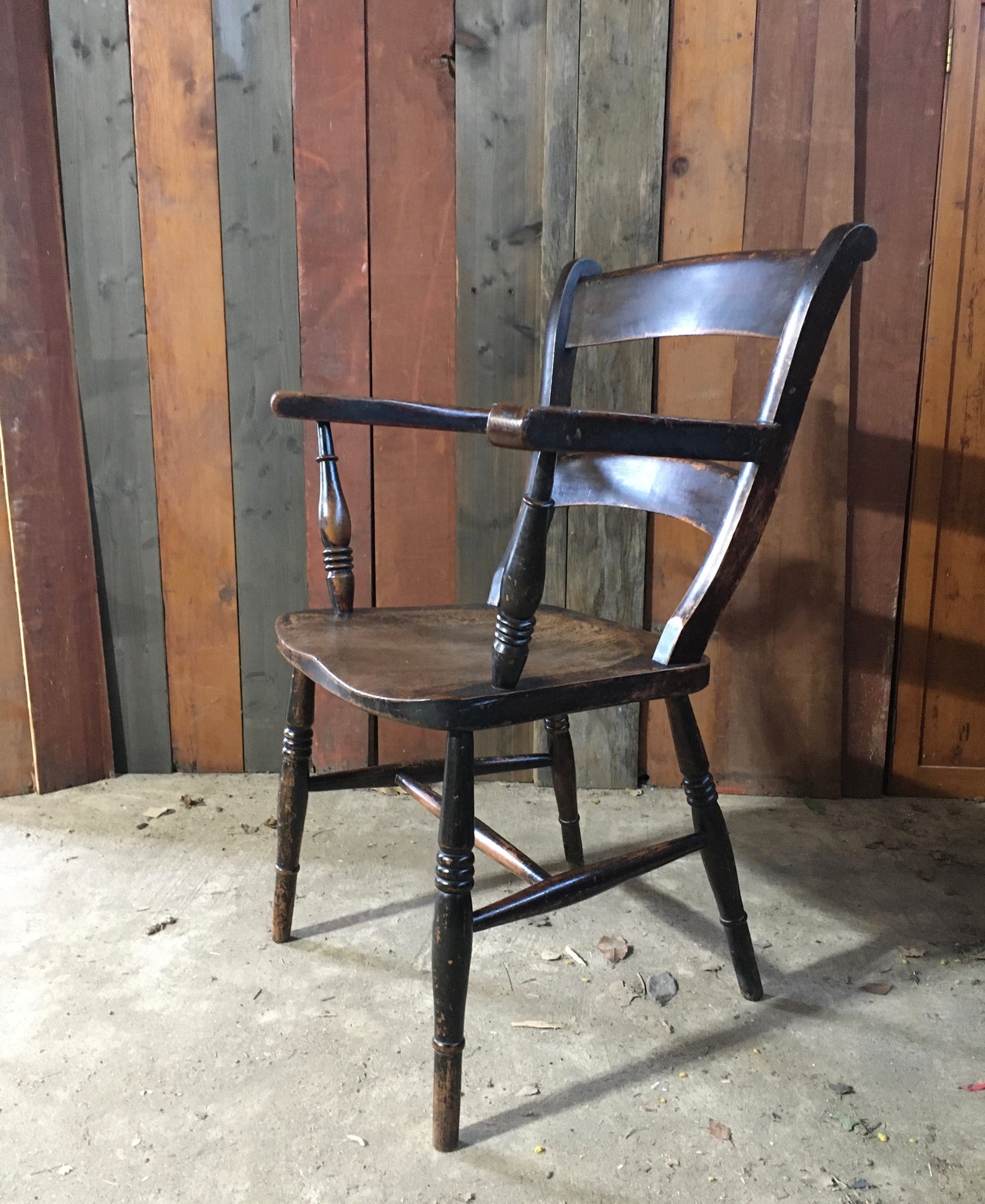 Late 19th century black-painted antique farmhouse kitchen chair.