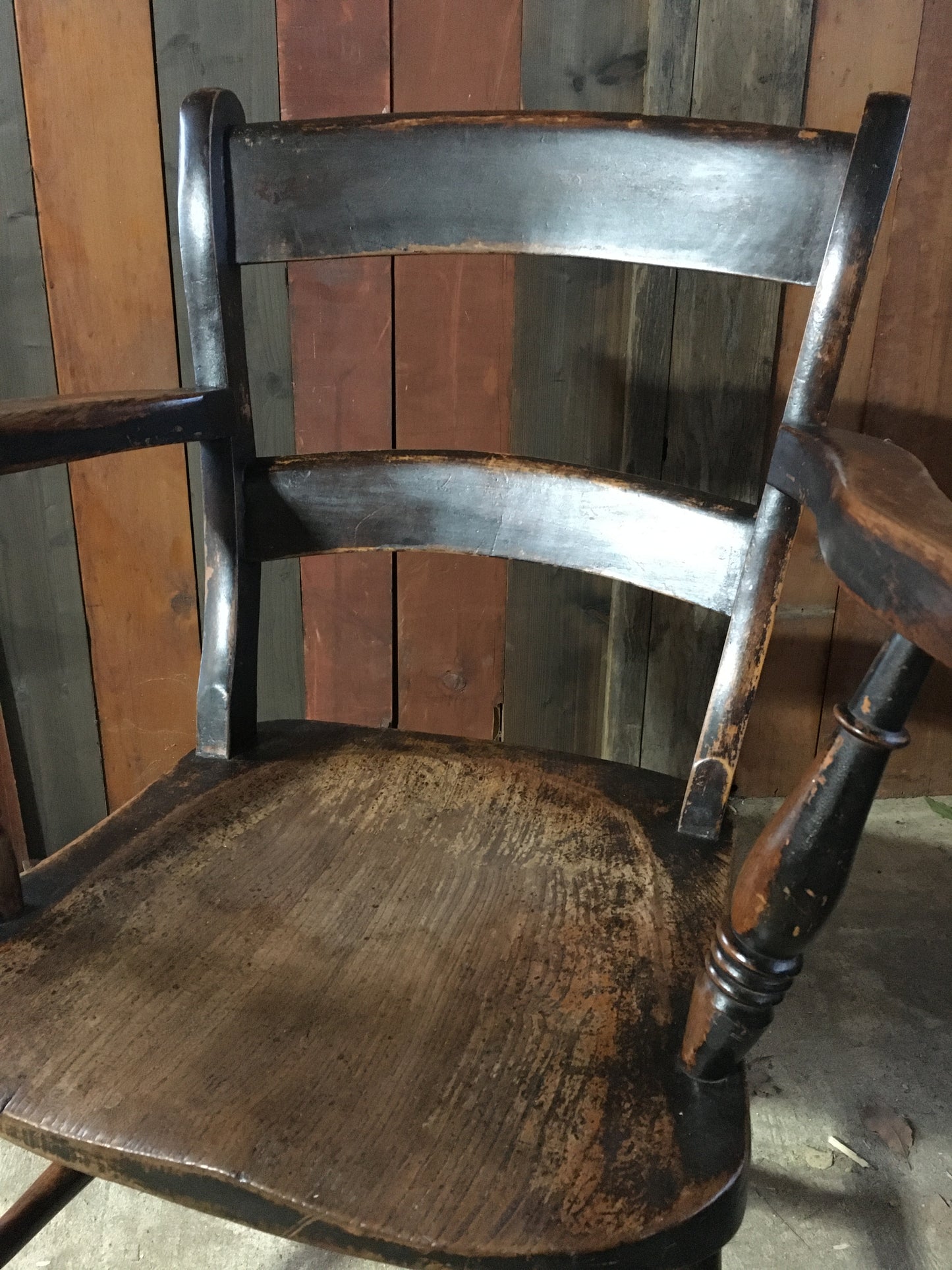 Late 19th century black-painted antique farmhouse kitchen chair.