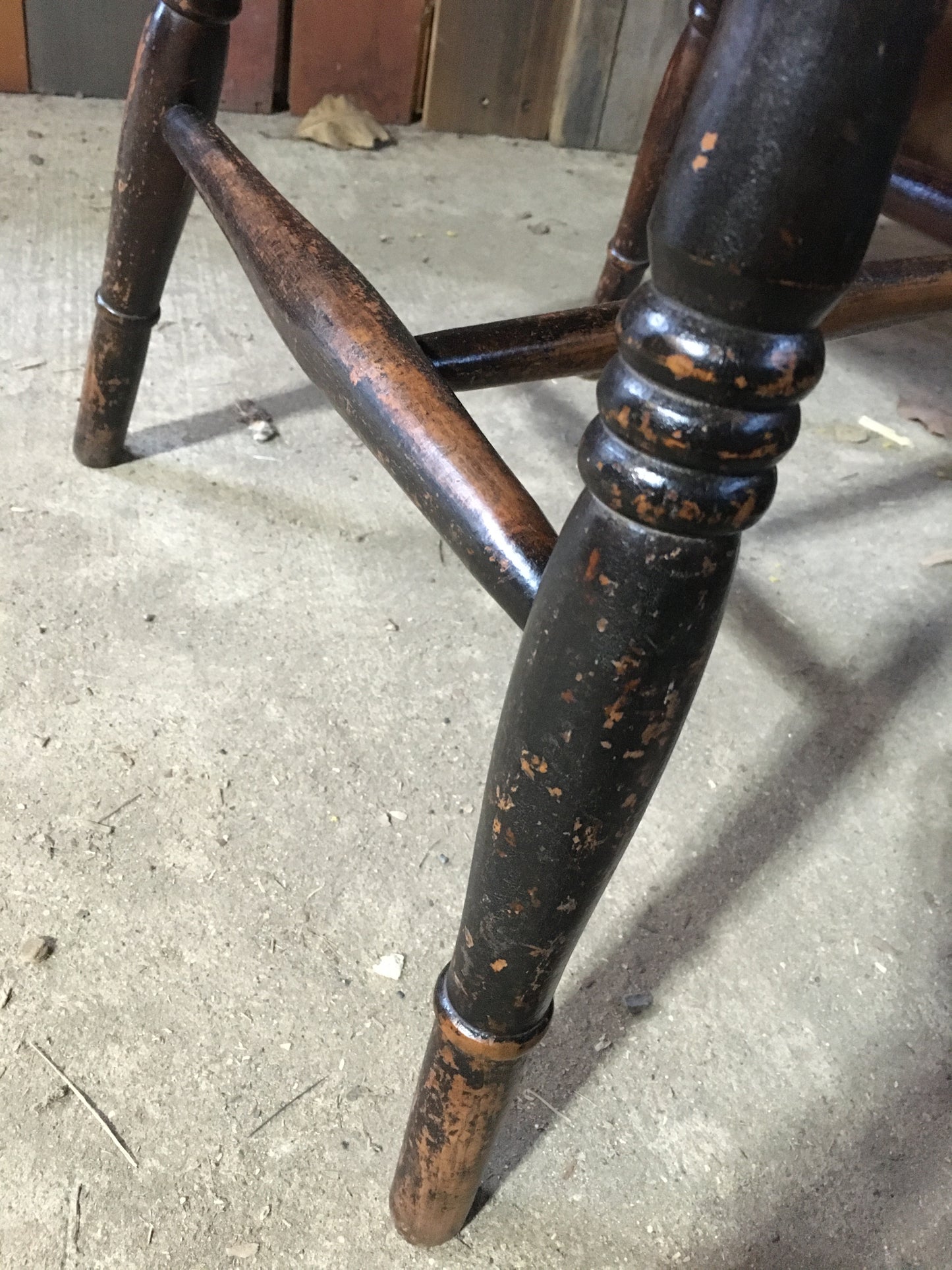 Late 19th century black-painted antique farmhouse kitchen chair.