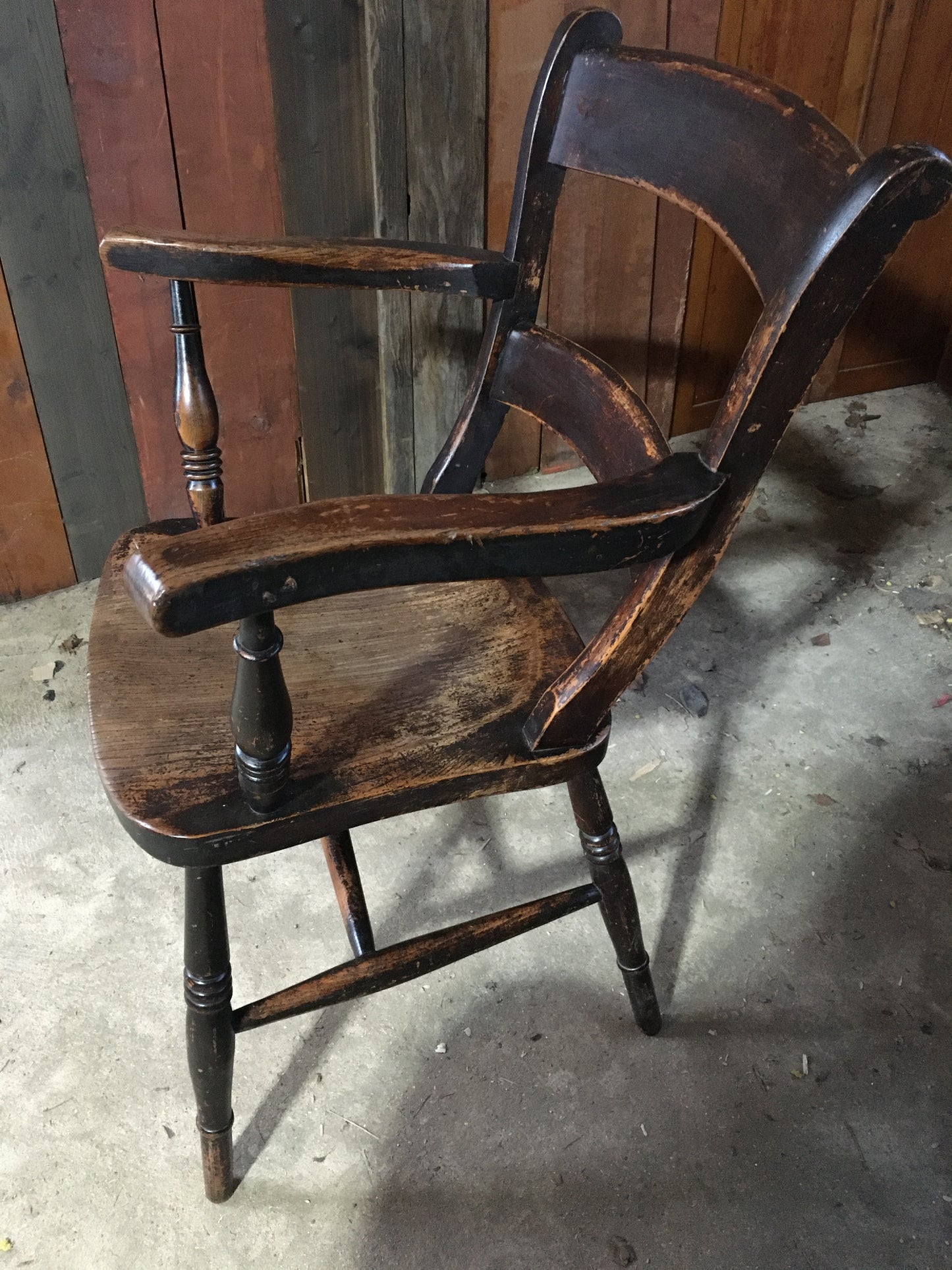 Late 19th century black-painted antique farmhouse kitchen chair.