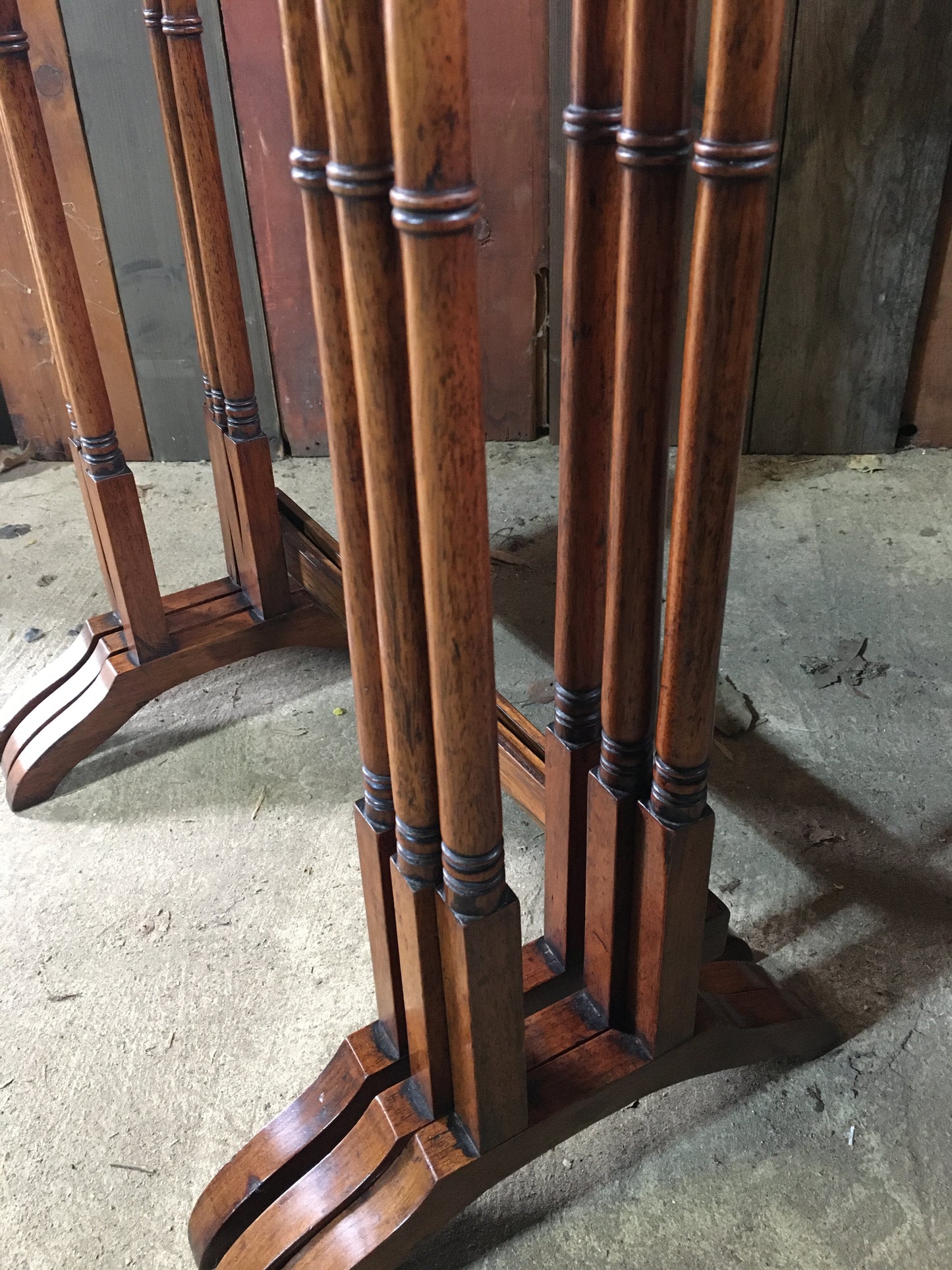 A nest of three late Regency rosewood tables.