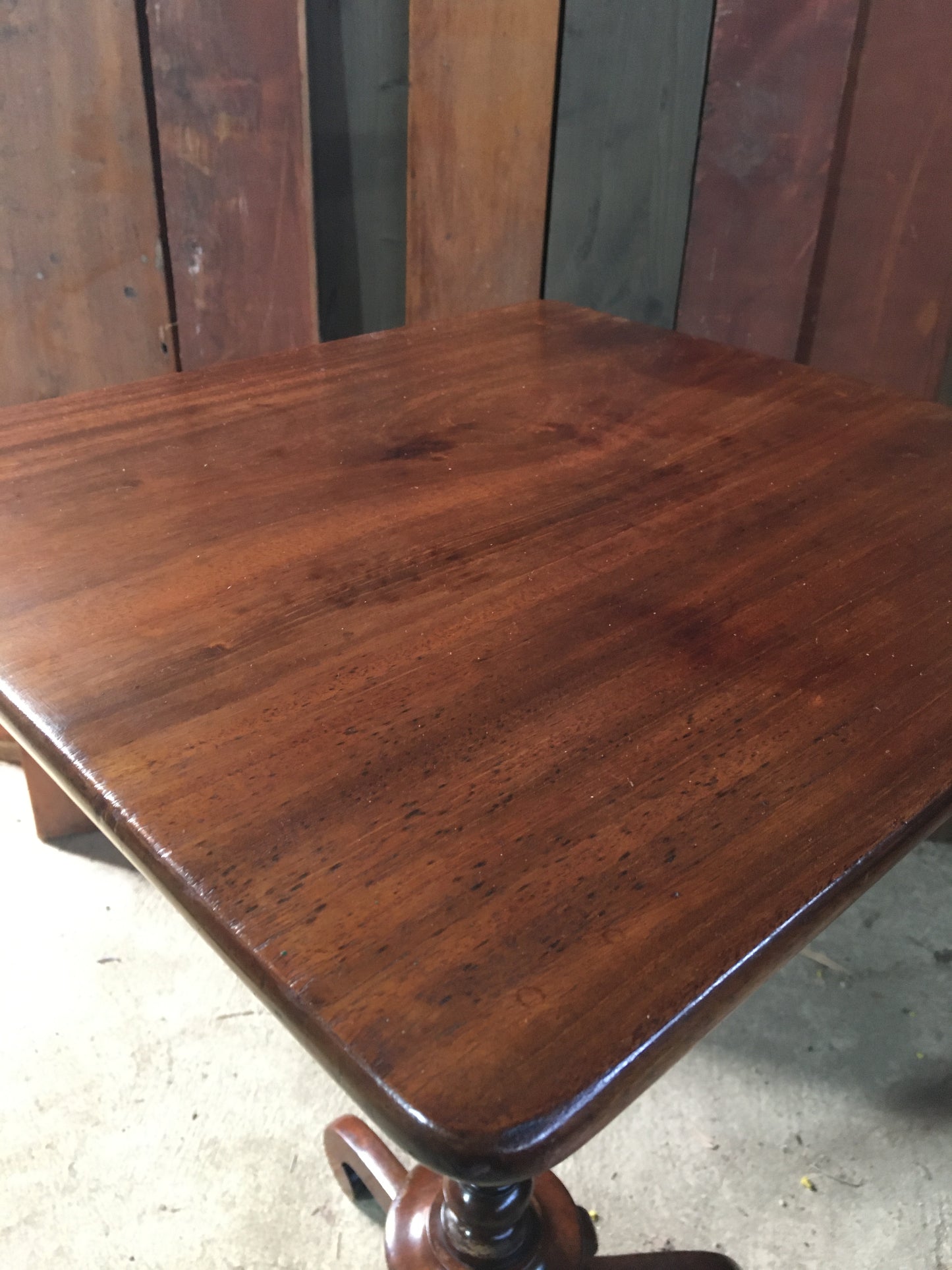 Elegant mahogany wine or tripod table.
