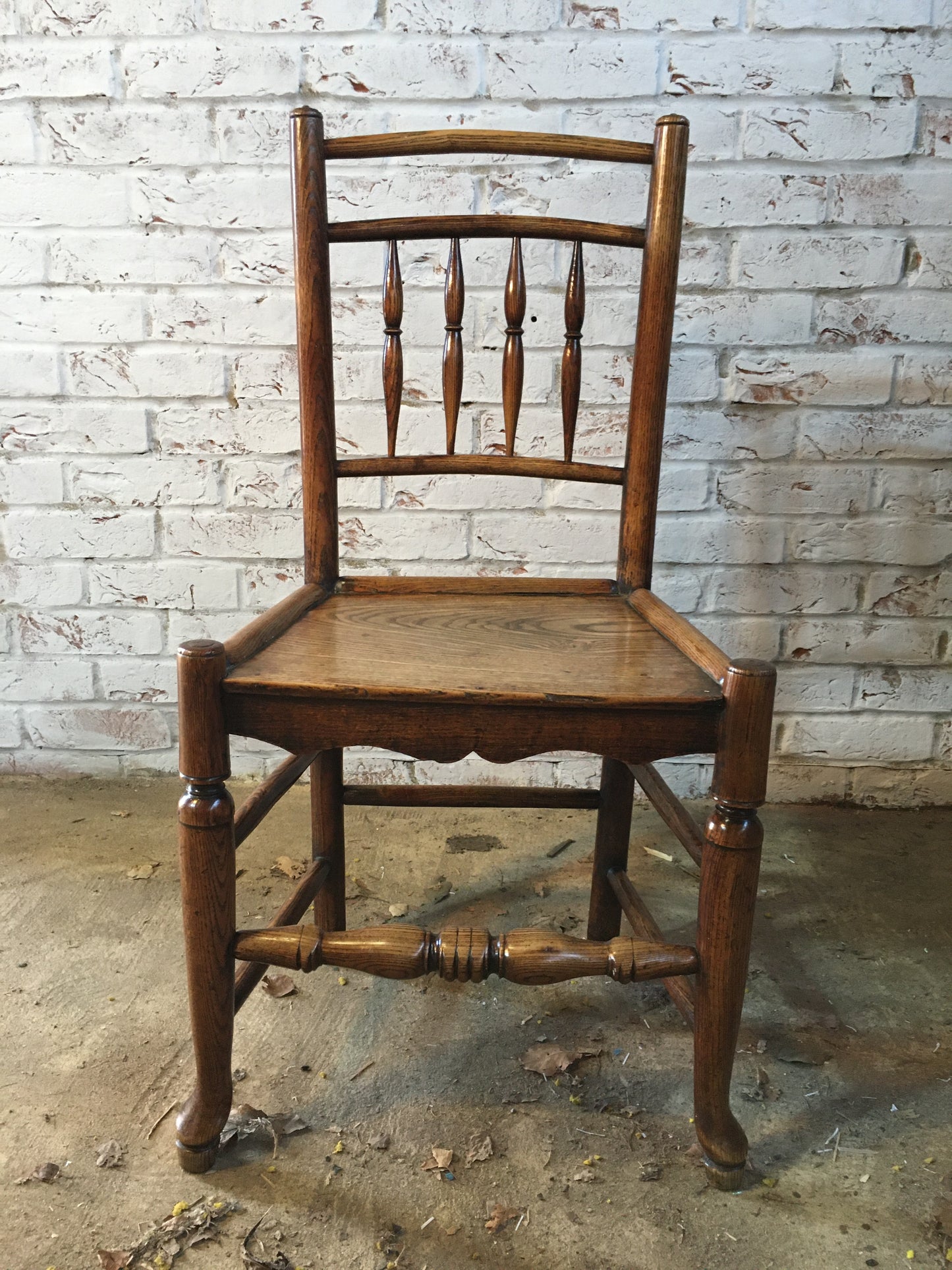 Early 19th century (or earlier) spindle-back side chair.