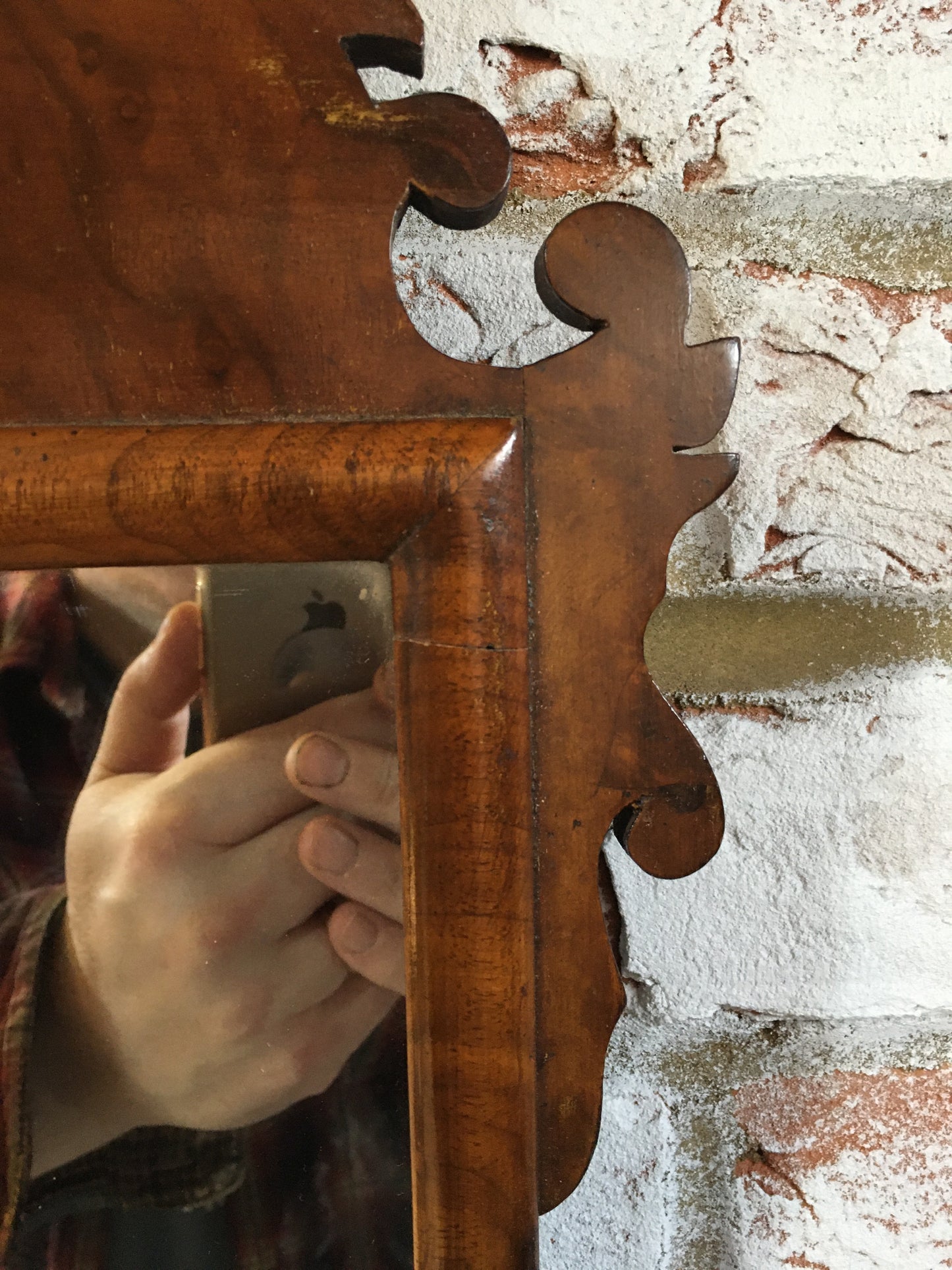 Georgian style walnut fret cut wall mirror.