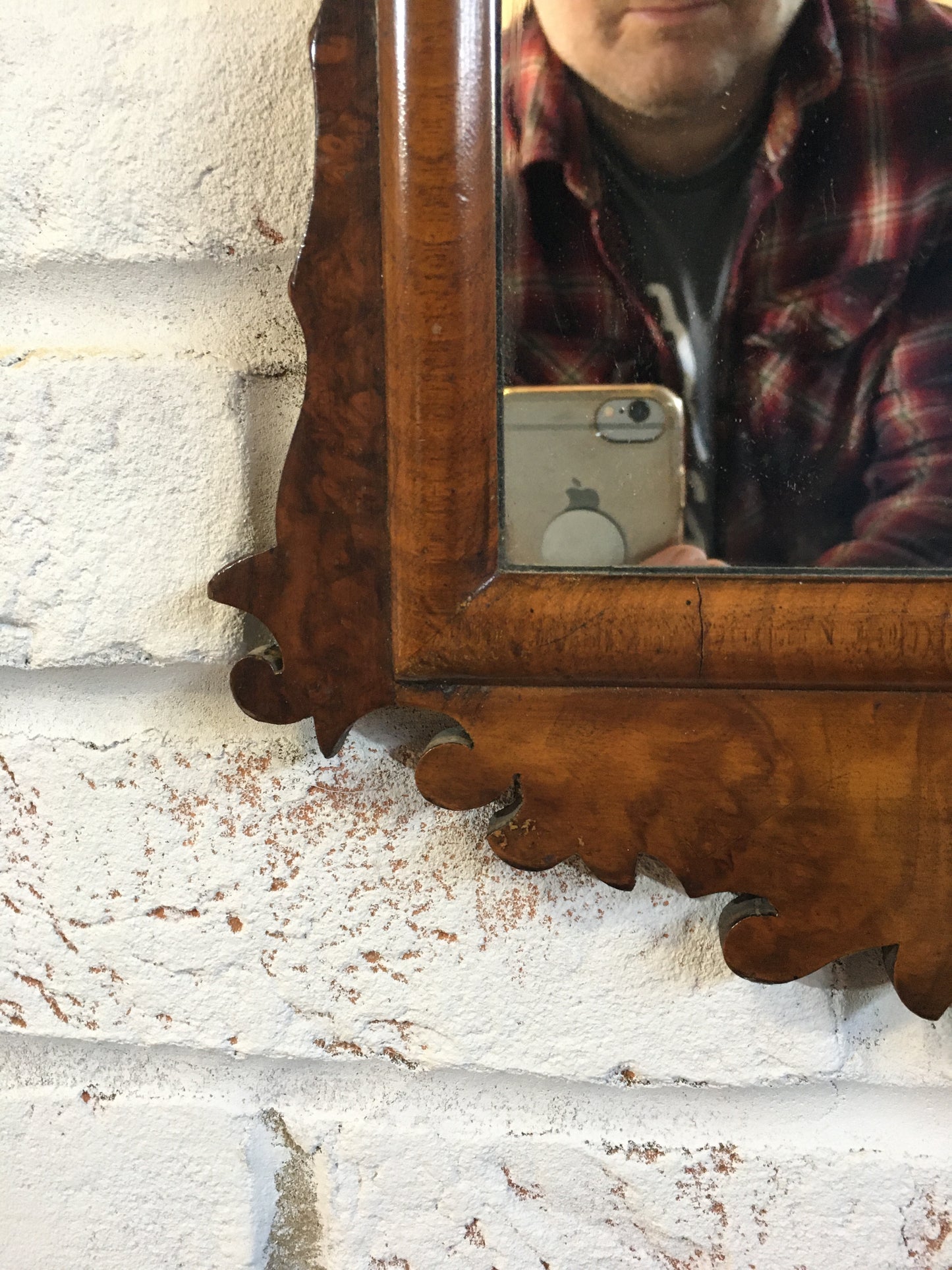 Georgian style walnut fret cut wall mirror.