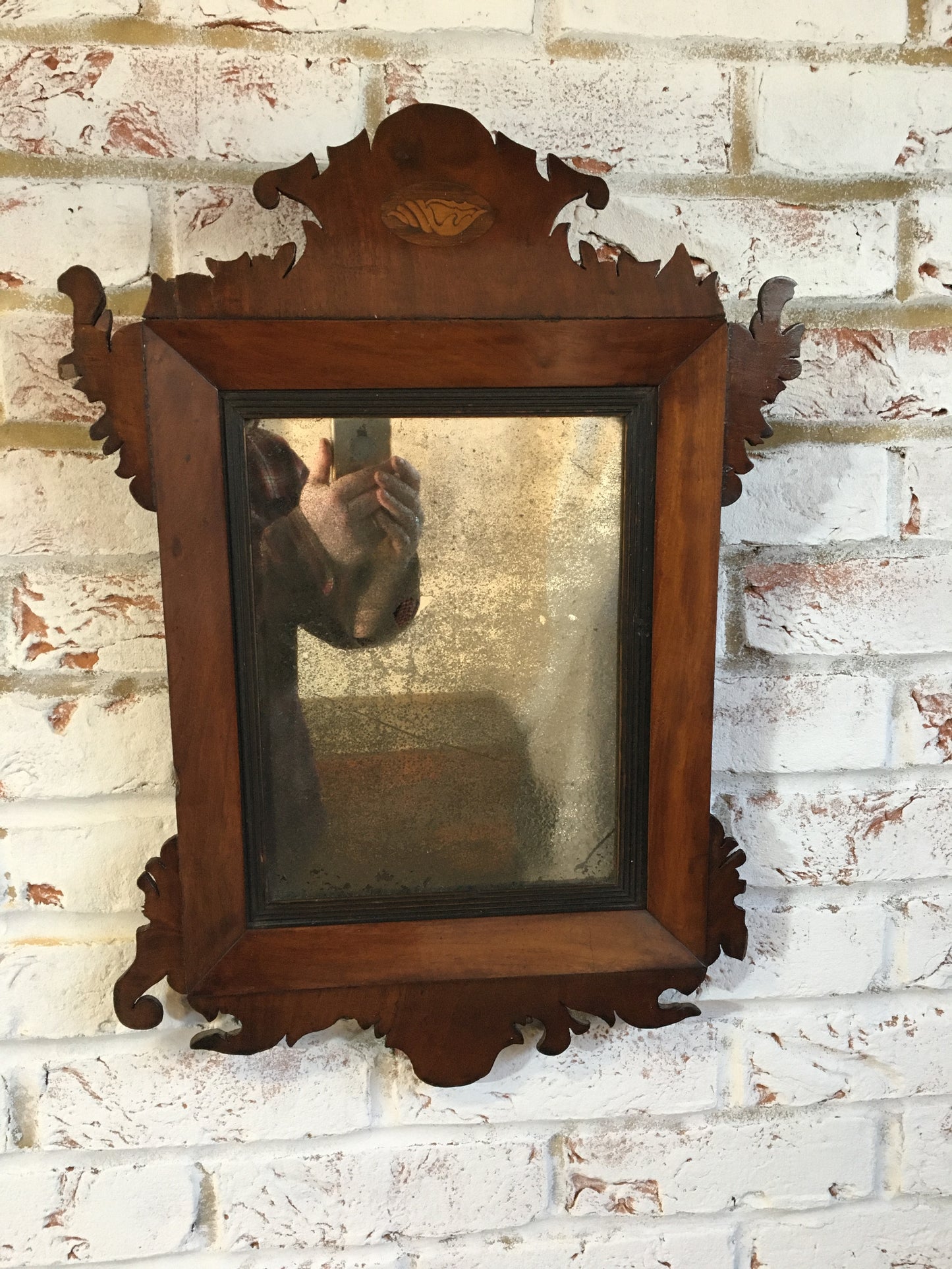 18th century mahogany wall mirror.