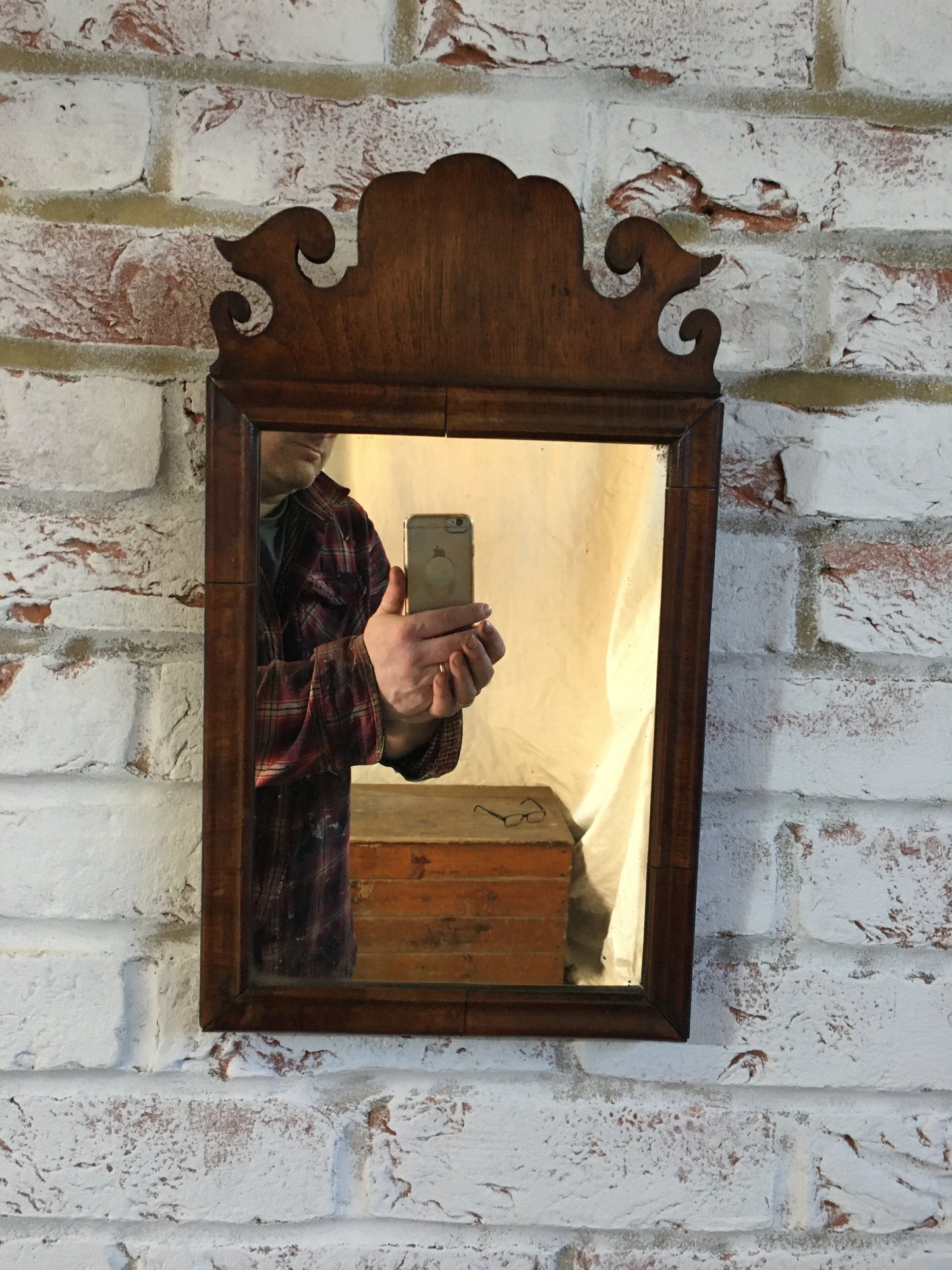 Small Georgian walnut fret cut wall mirror.