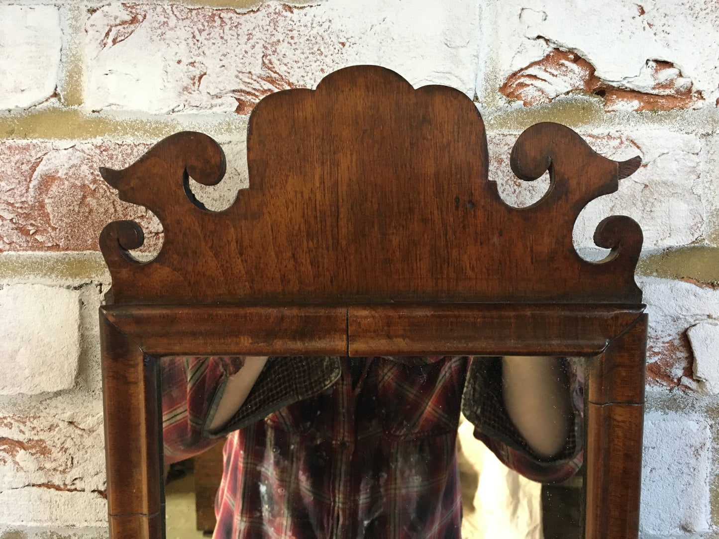 Small Georgian walnut fret cut wall mirror.